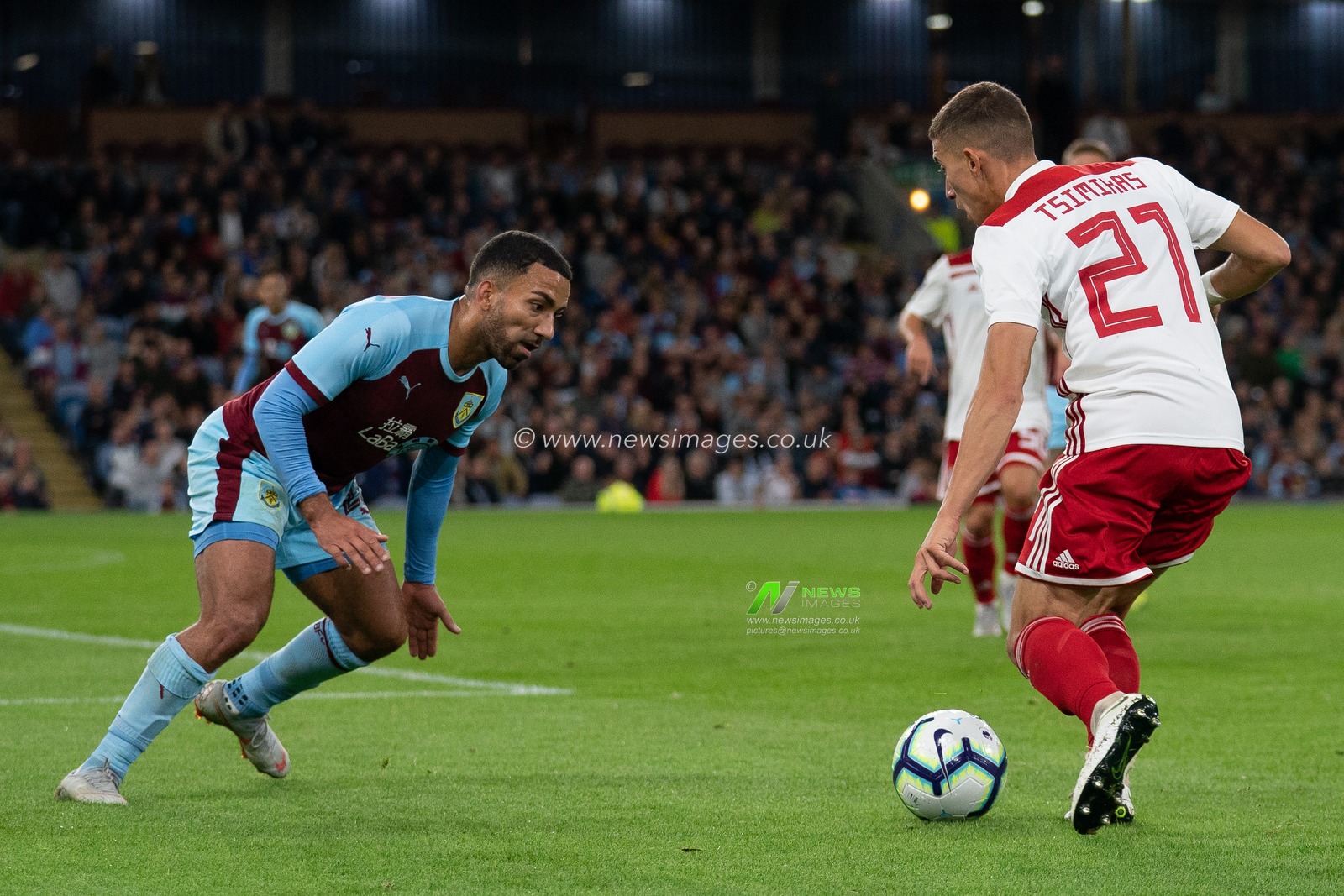 Olympiacos's Giannis Masouras under pressure from Burnley's Aaron Lennon

30th August 2018, Turf Moor, Burnley, England; UEFA Europa League, Play off leg 2 of 2, Burnley v Olympiacos FC