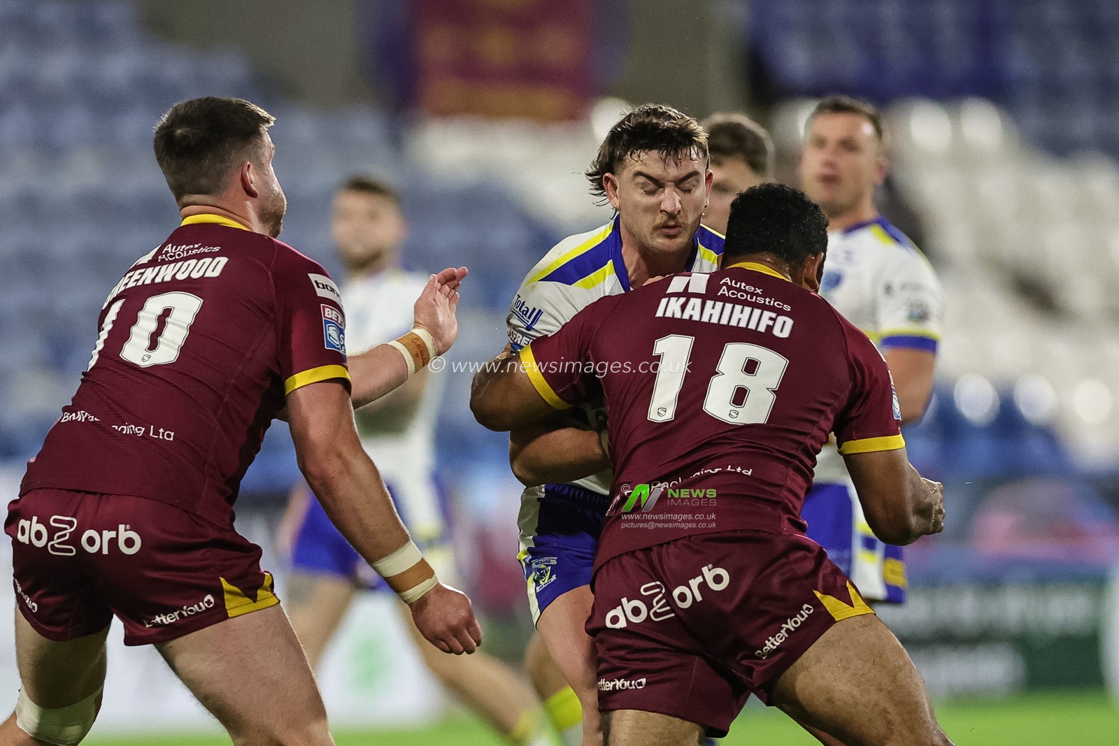 Jordy Crowther #36is tackled by Sebastine Ikahihifo of Huddersfield Giantsduring the Betfred Super League Round 27 match Huddersfield Giants vs Warrington Wolves at John Smith's Stadium, Huddersfield, United Kingdom, 22nd September 2023

(Photo by Mark Cosgrove/News Images)