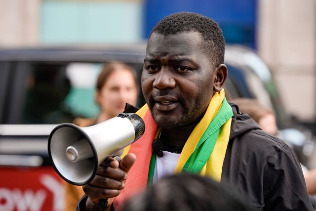 Former political detainee and youth activist Makomborero Haruzvishe speaks during Zimbabweans protest against the proposed constitution amendment at Embassy of Zimbabwe, London, United Kingdom on 18 April 2026

(Photo by Maynard Manyowa/News Images)