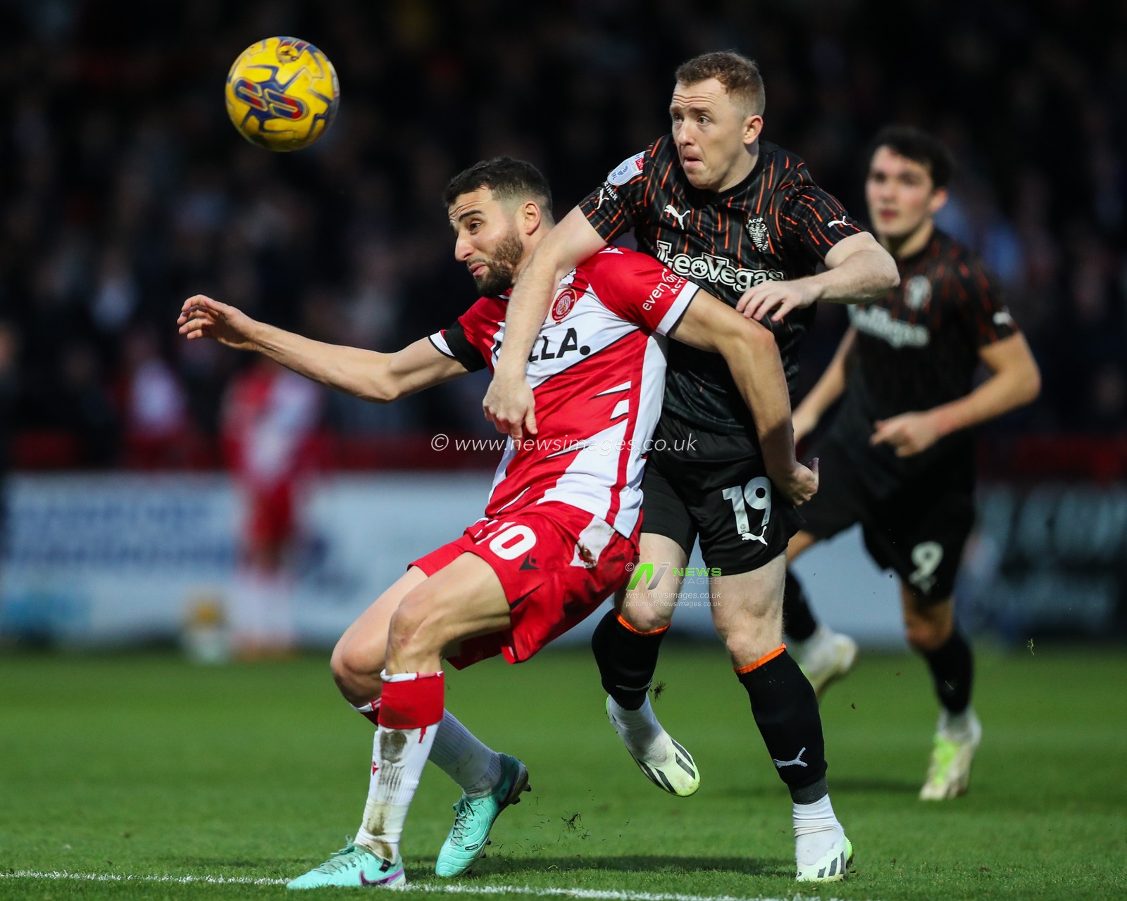Aaron Pressley of Stevenage â€˜and Shayne Lavery of Blackpool battle for the ball during the Sky Bet League 1 match Stevenage vs Blackpool at Lamex Stadium, Stevenage, United Kingdom, 3rd February 2024

(Photo by Gareth Evans/News Images)