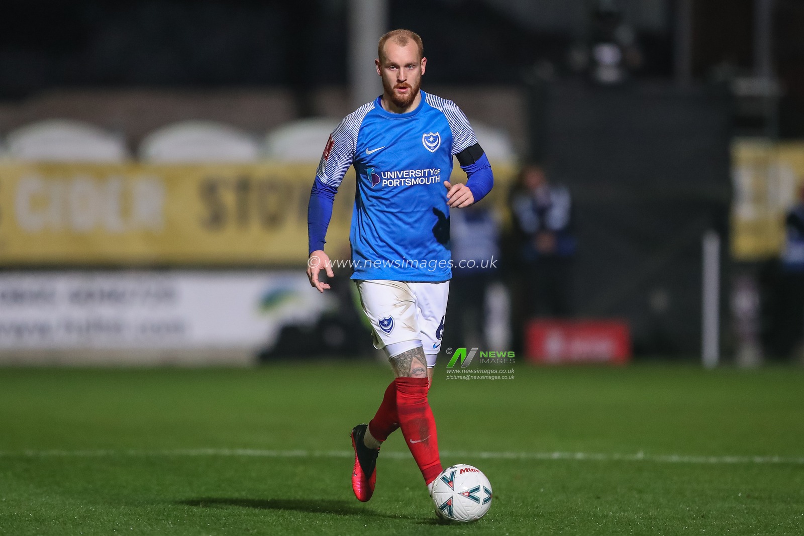 Connor Ogilvie #6 of Portsmouth runs with the ball during the Emirates FA Cup First Round match Hereford FC vs Portsmouth at Edgar Street, Hereford, United Kingdom, 4th November 2022

(Photo by Gareth Evans/News Images)