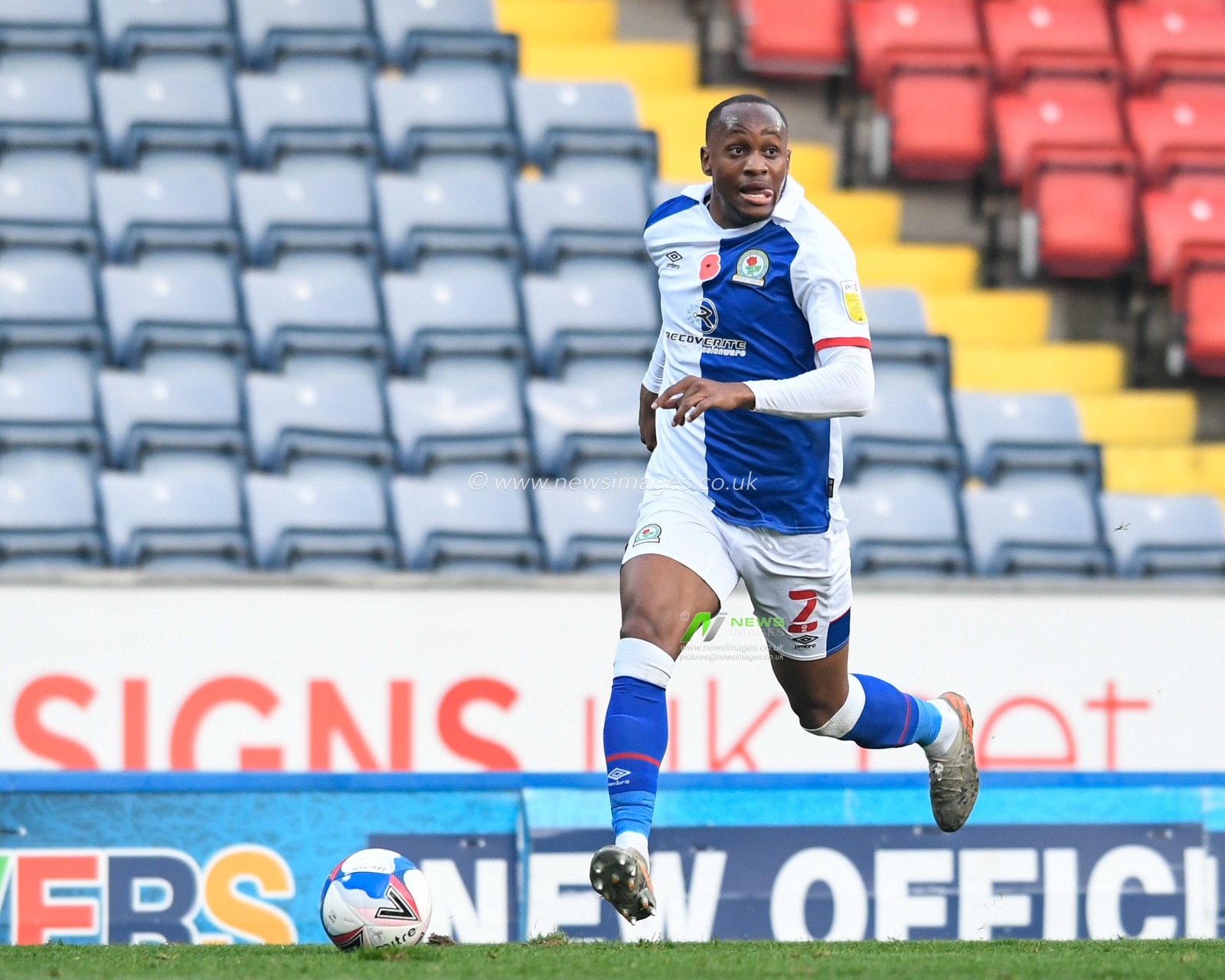 Ryan Nyambe #2 of Blackburn Rovers runs forward with the ball