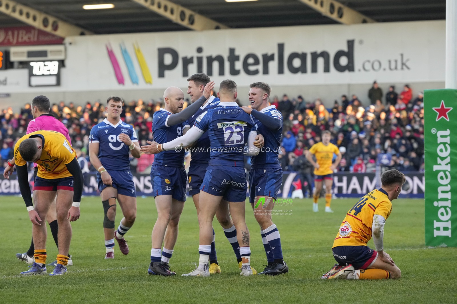 Sam James celebrates with Byron McGuigan #23 of Sale Sharks dives over to score a try during the European Champions Cup Group B match Sale Sharks vs Ulster Rugby at AJ Bell Stadium, Eccles, United Kingdom, 11th December 2022

(Photo by Steve Flynn/News Images)