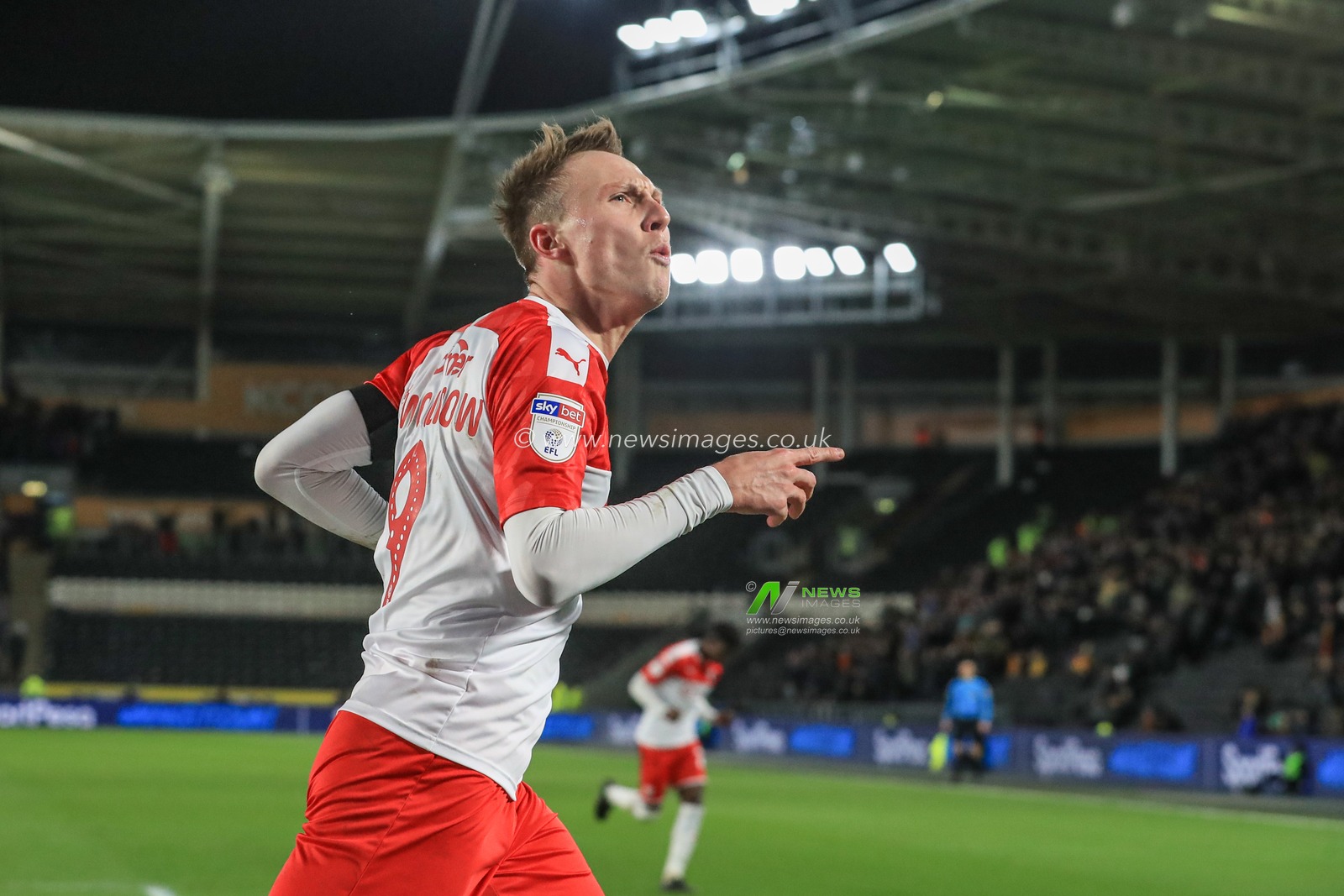 26th February 2020, KC Stadium, Kingston upon Hull, England; Sky Bet Championship, Hull City v Barnsley : Cauley Woodrow (9) of Barnsley celebrates his goal to make it 0-1