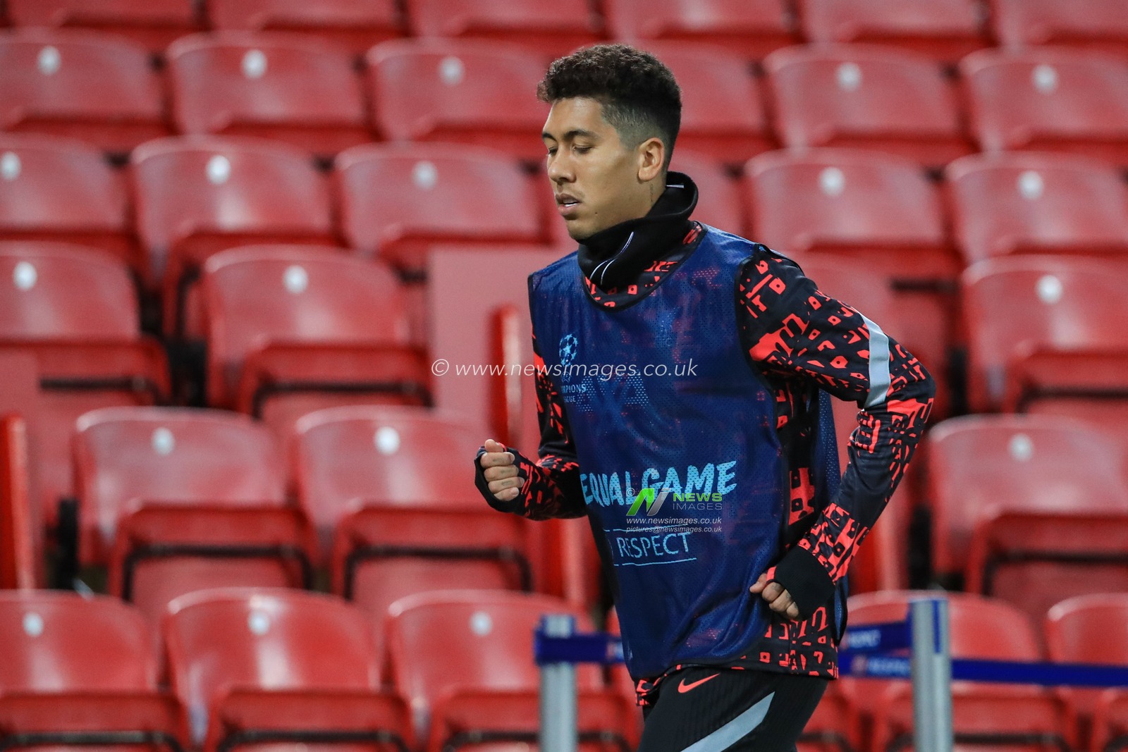 Roberto Firmino (9) of Liverpool warms up