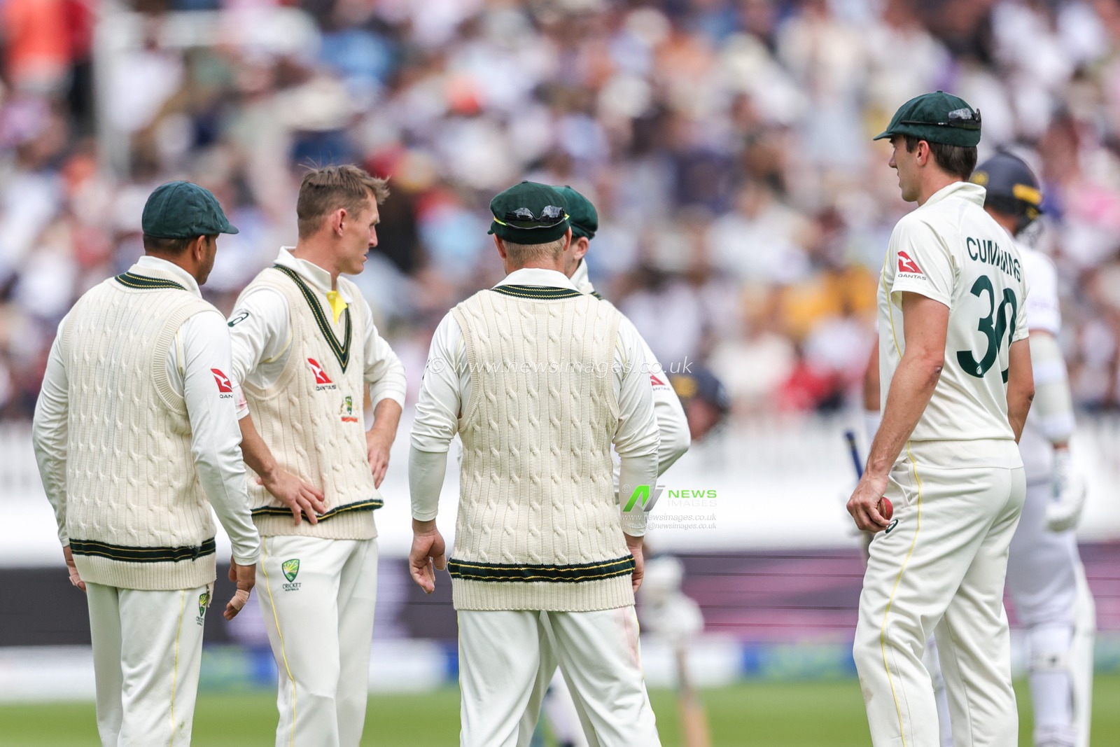 Pat Cummings of Australia gather his team mates to work out a game plane because England only have 79 more runs to make during the LV= Insurance Ashes Test Series Second Test Day 5 England v Australia at Lords, London, United Kingdom, 2nd July 2023

(Photo by Mark Cosgrove/News Images)