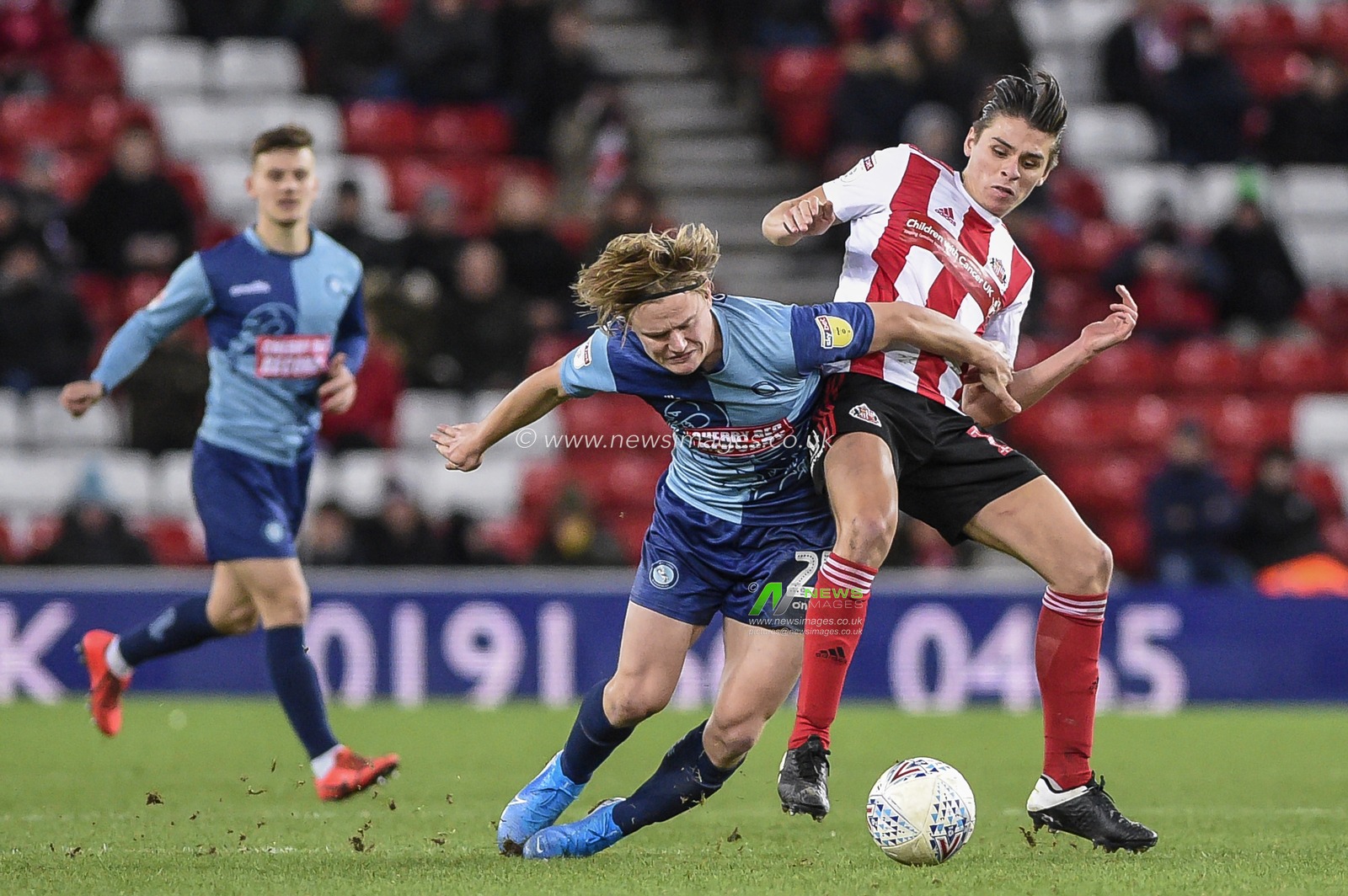 11th January 2020, Stadium Of Light, Sunderland, England; Sky Bet League 1, Sunderland v Wycombe Wanderers : Alex Samuel (25) of Wycombe Wanderers battles for possession with George Dobson (18) of Sunderland

Credit: Iam Burn/News Images