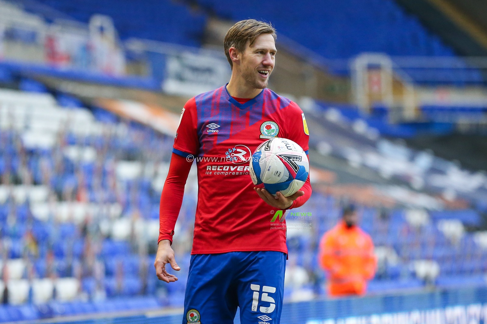 Barry Douglas #15 of Blackburn Rovers takes a throw in