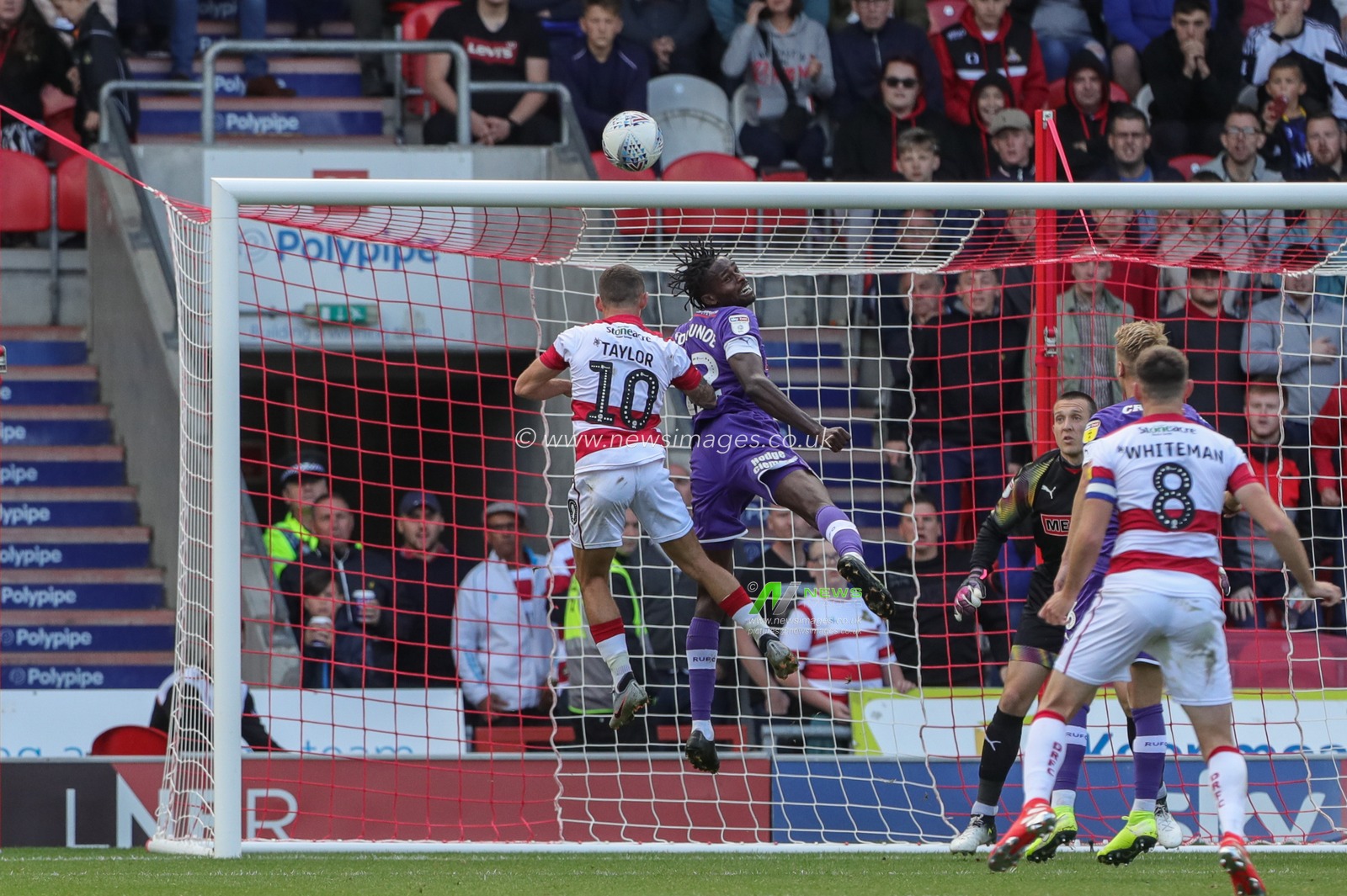 7th September 2019, Keepmoat Stadium, Doncaster, England; Sky Bet League One Football, Doncaster Rovers vs Rotherham United ; Jon Taylor (10) of Doncaster Rovers and Matthew Olosunde (22) of Rotherham United dual for the ball 



Credit: Mark Cosgrove/News Images

English Football League images are subject to DataCo Licence