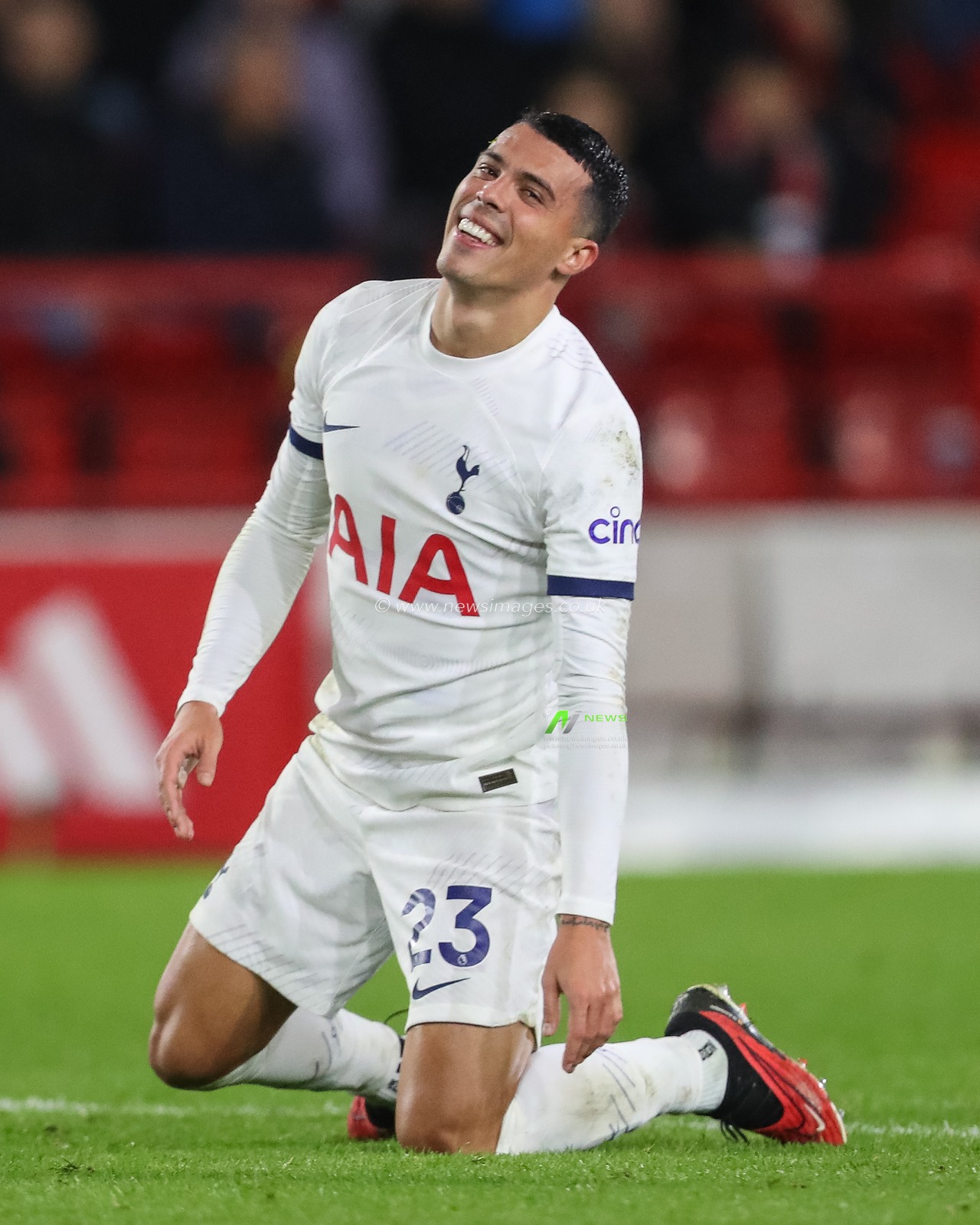 Pedro Porro #23 of Tottenham Hotspur smiles as he gets up off the floor during the Premier League match Nottingham Forest vs Tottenham Hotspur at City Ground, Nottingham, United Kingdom, 15th December 2023

(Photo by Gareth Evans/News Images)