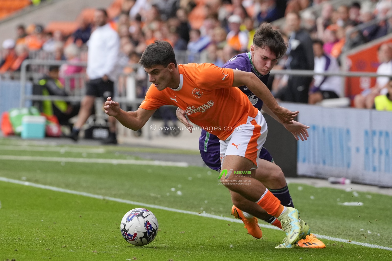 Rob Apter #36 of Blackpool turns inside Jacob MacIntyre #44 of Hibernian during the Pre-season friendly match Blackpool vs Hibernian at Bloomfield Road, Blackpool, United Kingdom, 29th July 2023

(Photo by Steve Flynn/News Images)