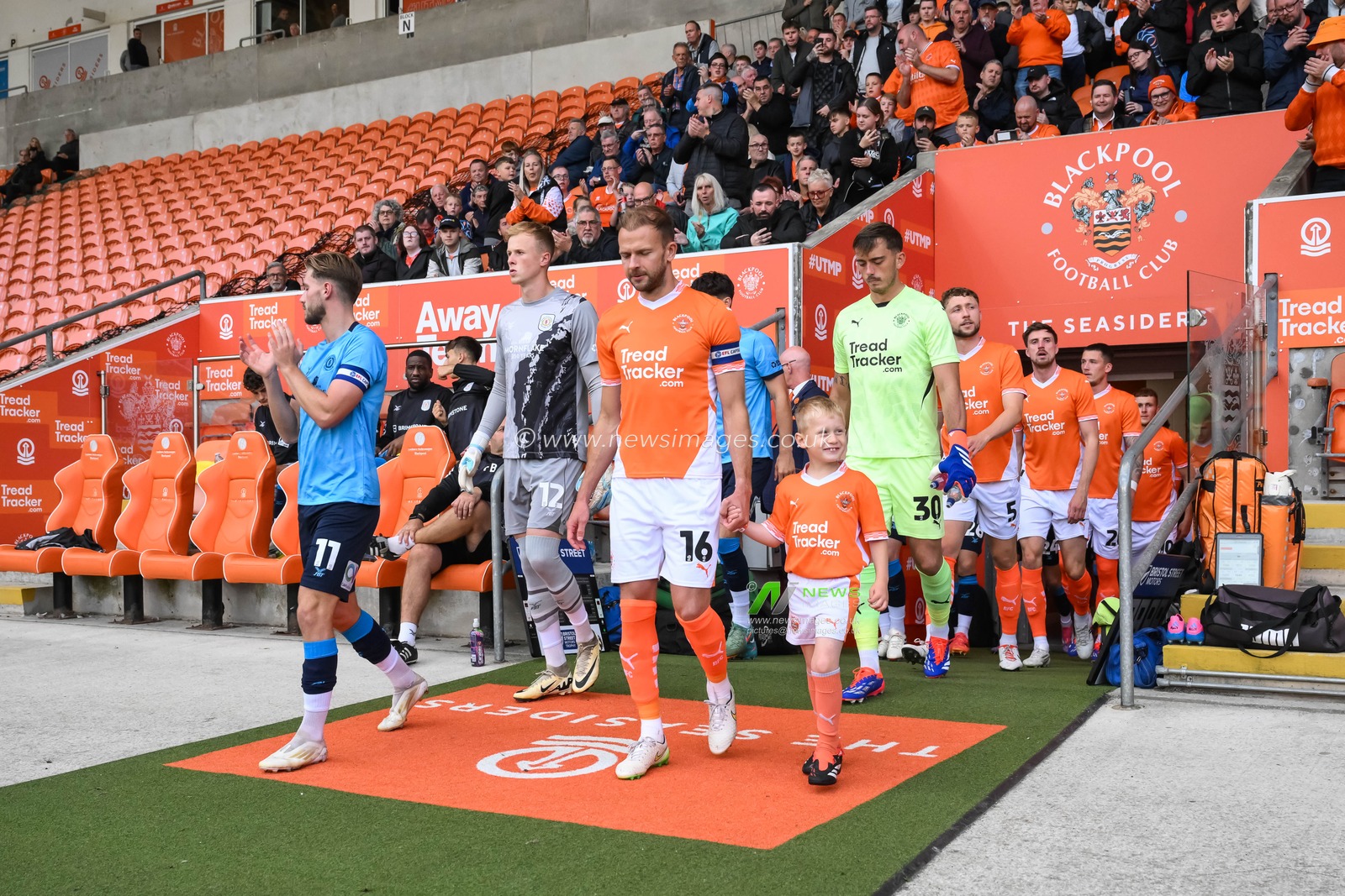 Jordan Rhodes of Blackpool leads his team out ahead of the Bristol Street Motors Trophy match Blackpool vs Crewe Alexandra at Bloomfield Road, Blackpool, United Kingdom, 3rd September 2024

(Photo by Craig Thomas/News Images)