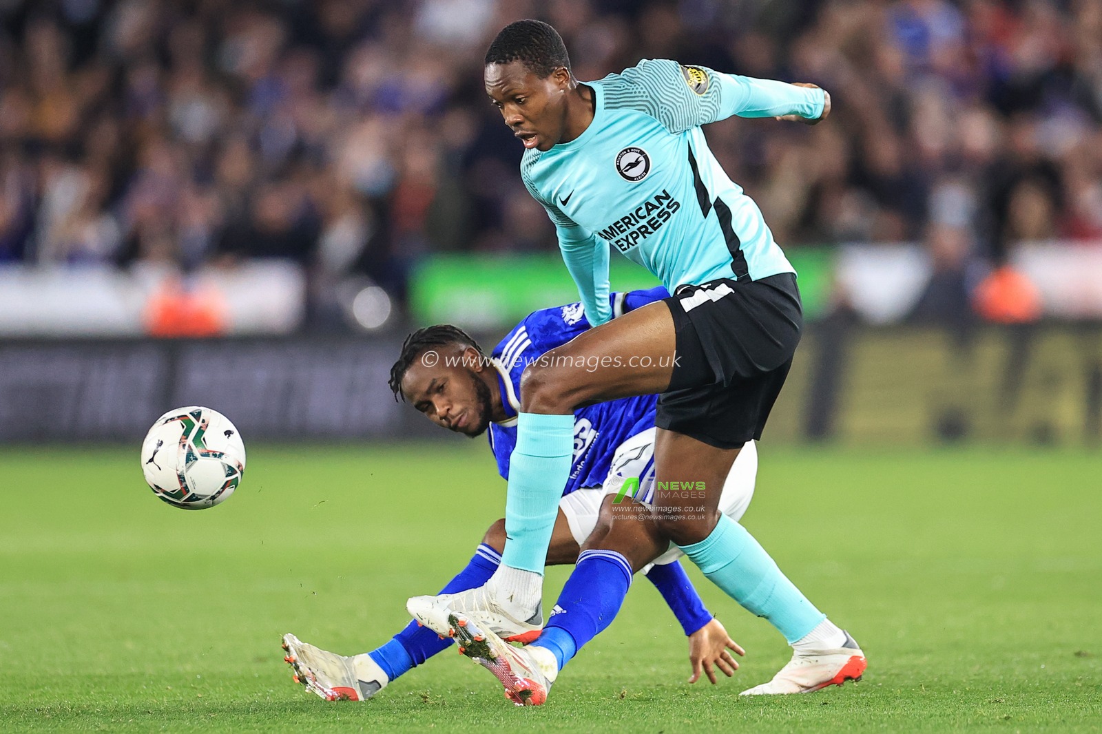 Ademola Lookman #37 of Leicester City and Enock Mwepu #12 of Brighton & Hove Albion battle for the ball