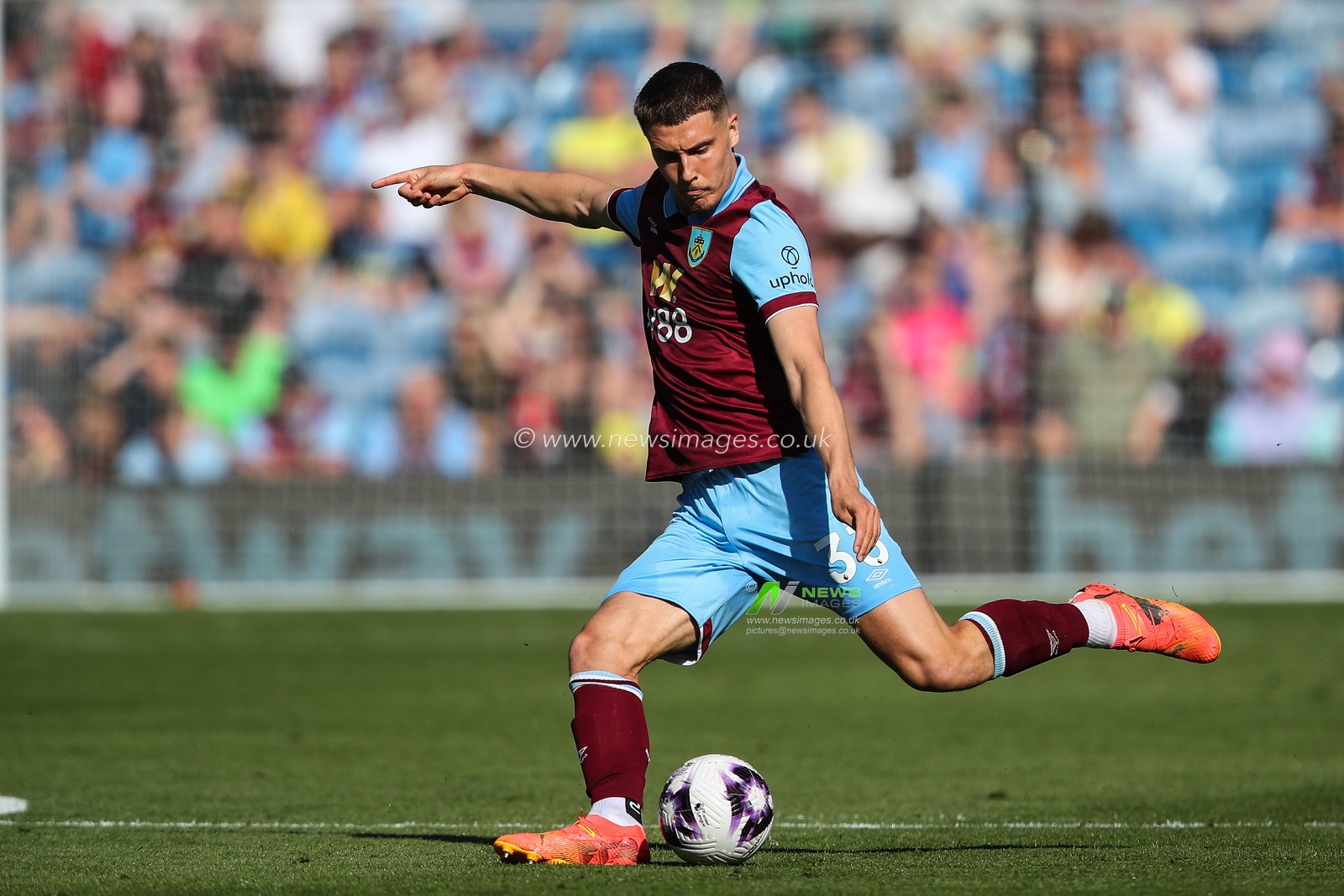 Maxime Esteve of Burnley passes the ball during the Premier League match Burnley vs Nottingham Forest at Turf Moor, Burnley, United Kingdom, 19th May 2024

(Photo by Gareth Evans/News Images)