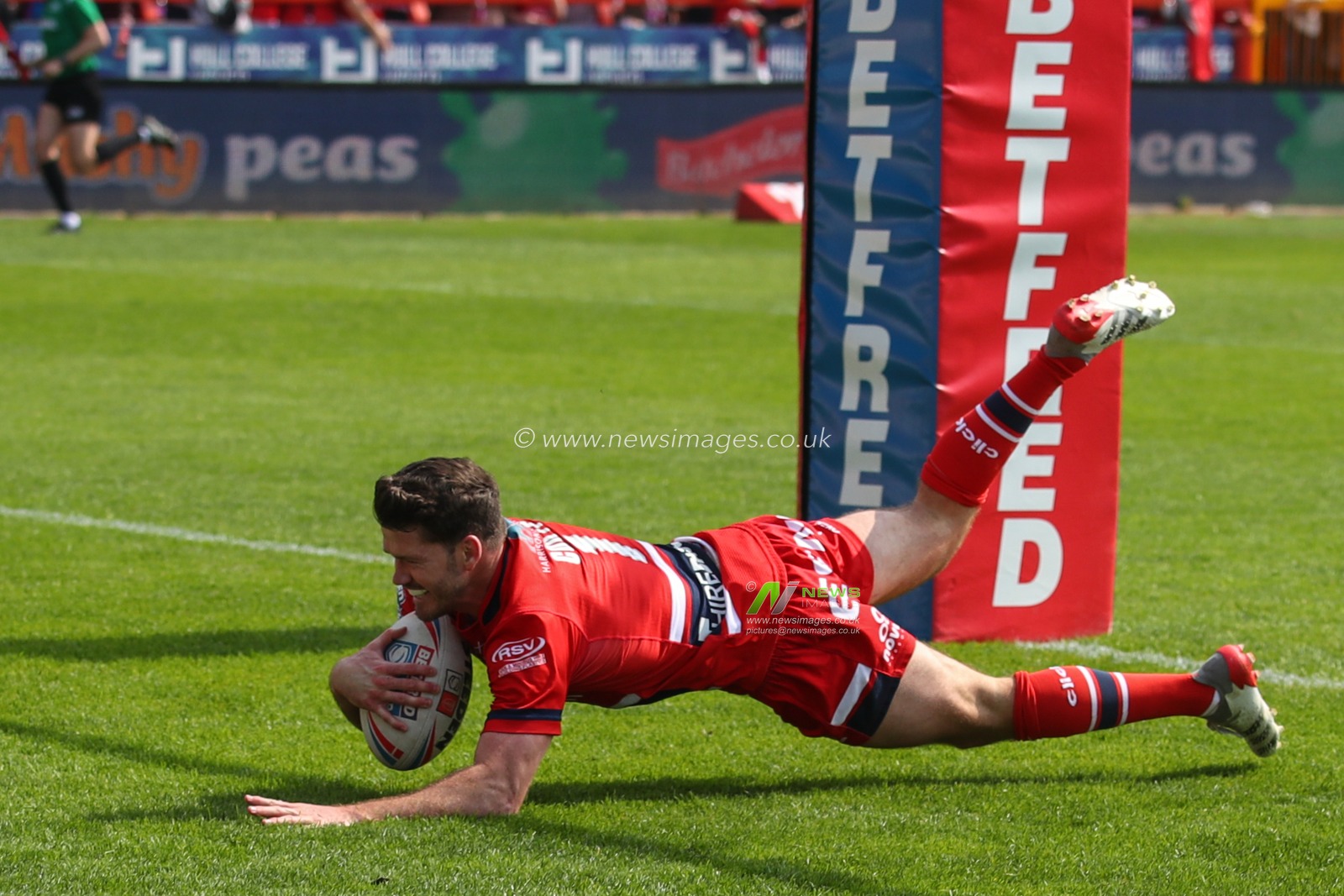 Lachlan Coote #1 of Hull KR goes over for his second try of the match