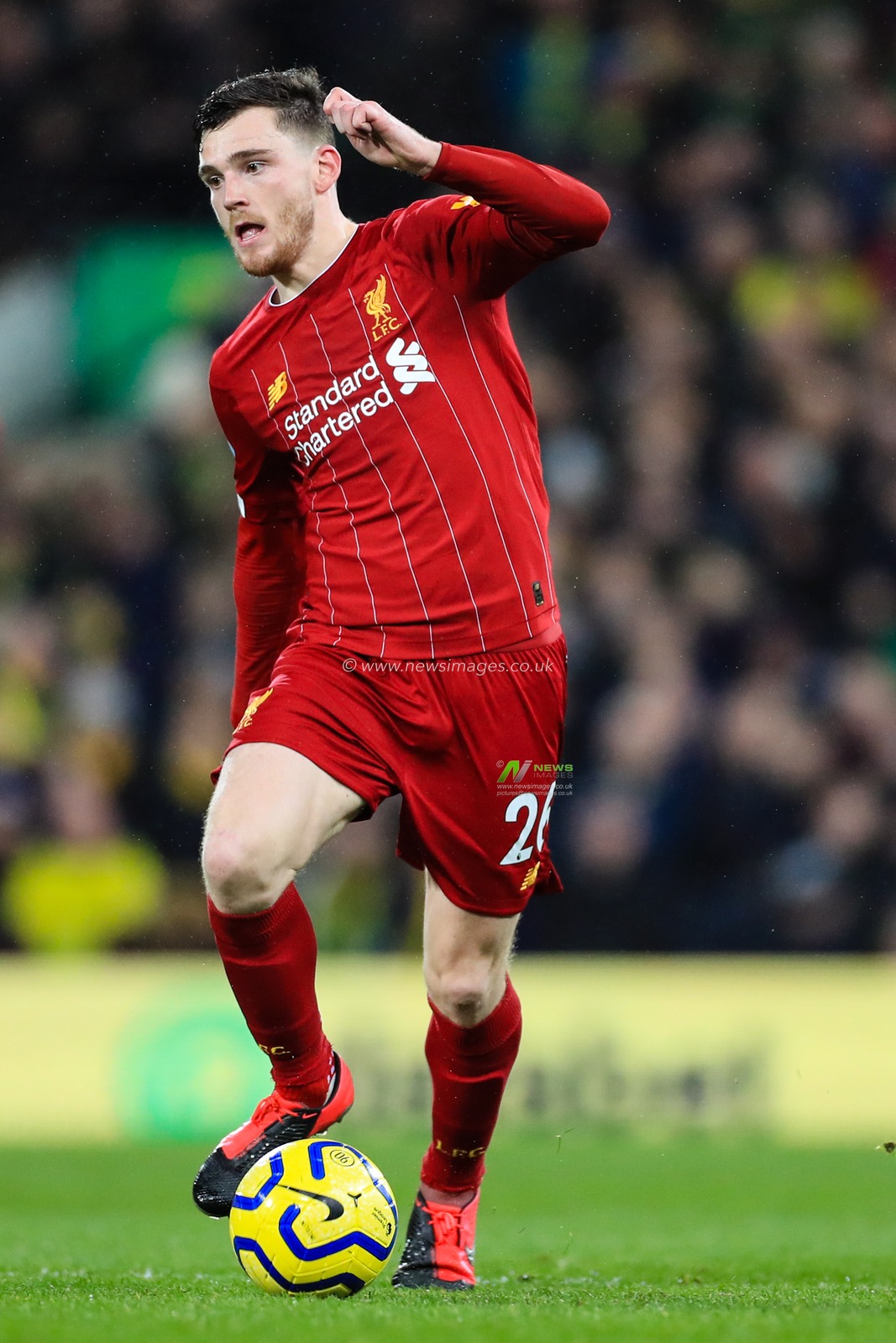 15th February 2020, Carrow Road, Norwich, England; Premier League, Norwich City v Liverpool : Andrew Robertson (26) of Liverpool with the ball