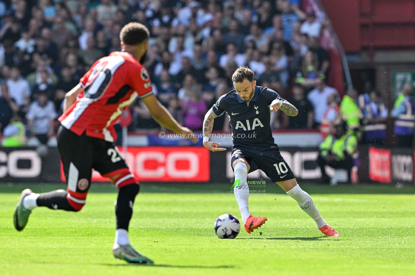 James Maddison of Tottenham Hotspur passes the ball, during the Premier League match Sheffield United vs Tottenham Hotspur at Bramall Lane, Sheffield, United Kingdom, 19th May 2024

(Photo by Cody Froggatt/News Images)