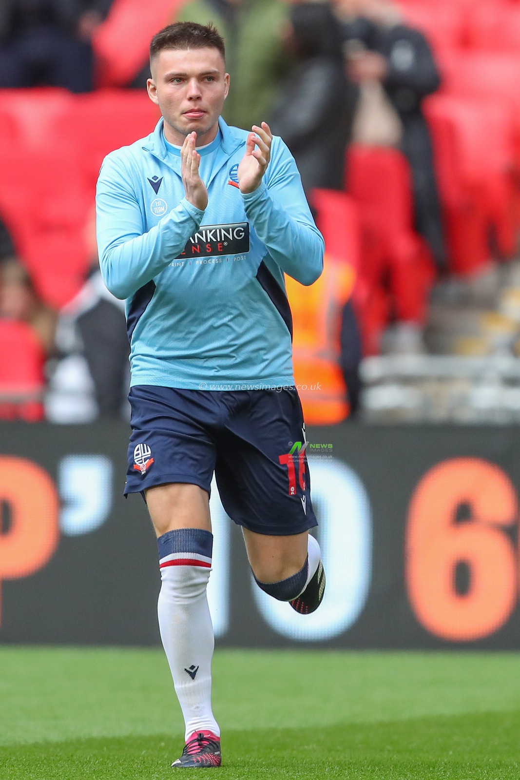 Aaron Morley #16 of Bolton Wanderers applauds the Bolton Wanderers fans during the pre-game warm up ahead of the Papa John's Trophy Final match Bolton Wanderers vs Plymouth Argyle at Wembley Stadium, London, United Kingdom, 2nd April 2023

(Photo by Gareth Evans/News Images)