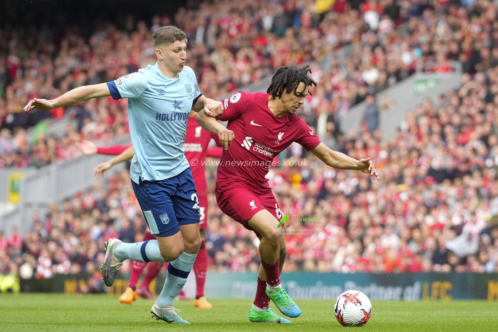 Vitaly Janelt #27 of Brentford competes for the ball with Trent Alexander-Arnold #66 of Liverpool during the Premier League match Liverpool vs Brentford at Anfield, Liverpool, United Kingdom, 6th May 2023

(Photo by Steve Flynn/News Images)