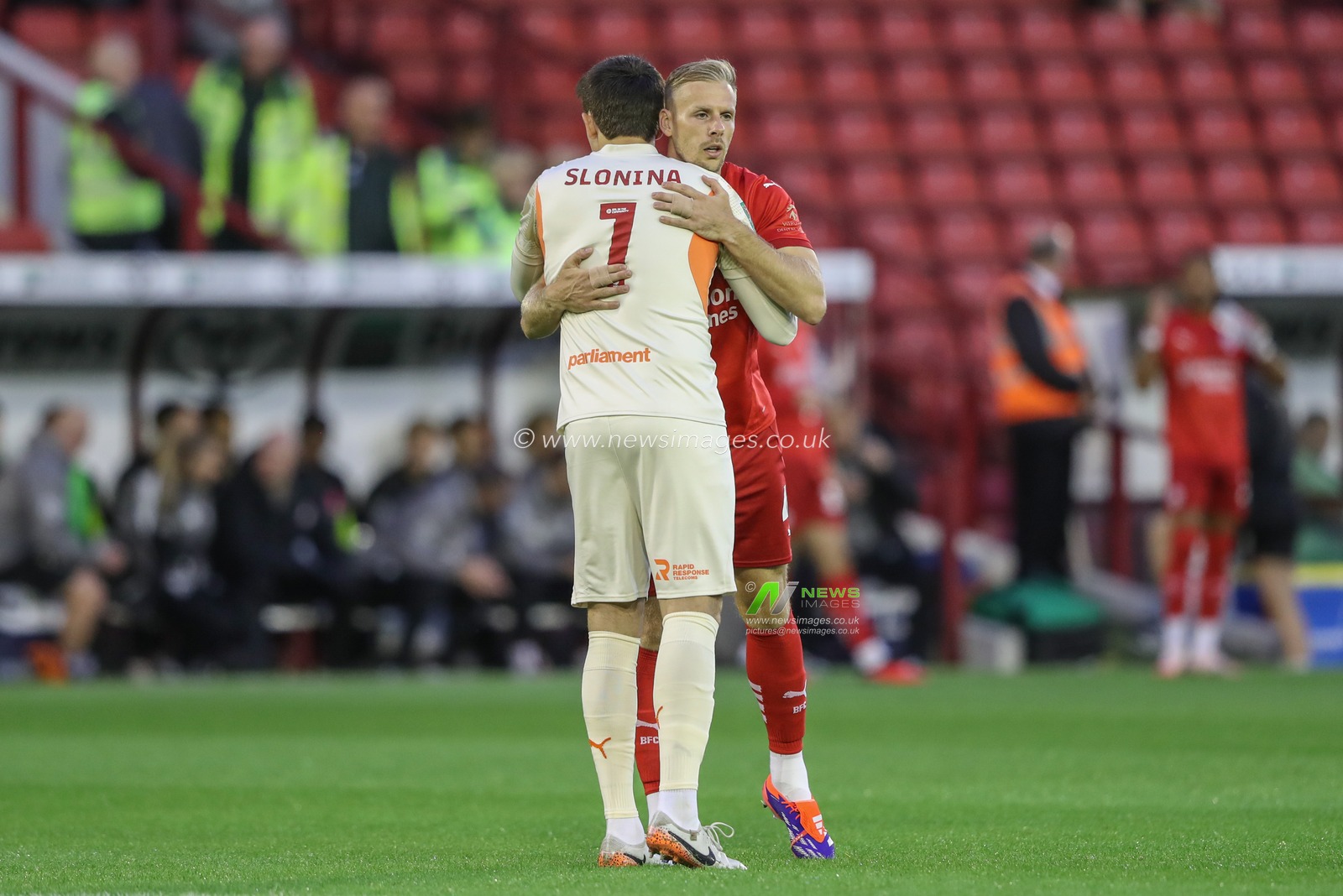 Gabriel Slonina of Barnsley embraces Marc Roberts of Barnsley before the game during the Carabao Cup match Barnsley vs Sheffield United at Oakwell, Barnsley, United Kingdom, 27th August 2024

(Photo by Alfie Cosgrove/News Images)