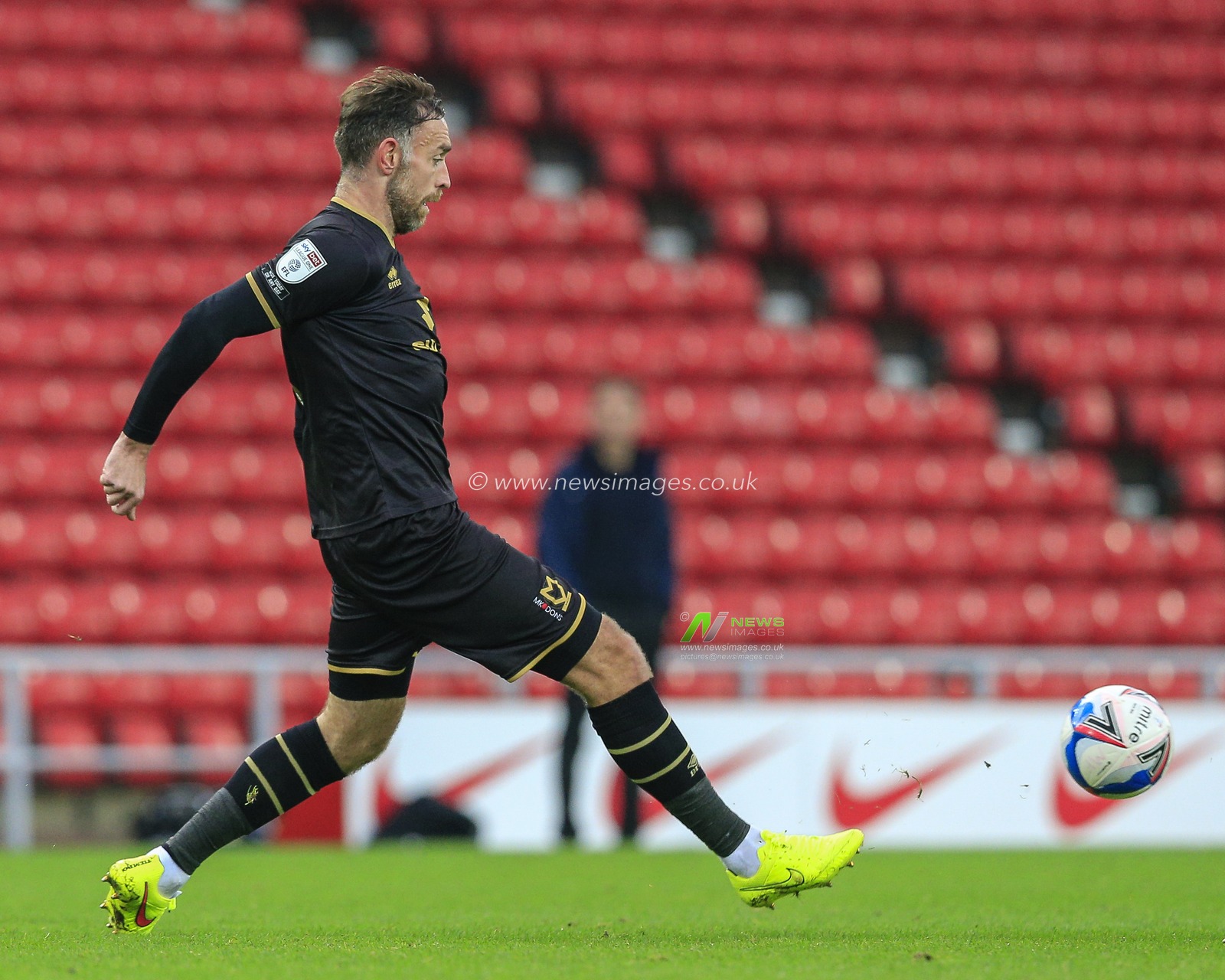 Richard Keogh #4 of Milton Keynes Dons with the ball