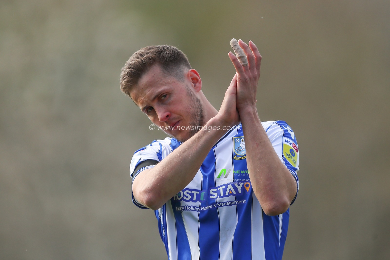 Will Vaulks #4 of Sheffield Wednesday applauds the travelling fans after the Sky Bet League 1 match Burton Albion vs Sheffield Wednesday at Pirelli Stadium, Burton upon Trent, United Kingdom, 15th April 2023

(Photo by Gareth Evans/News Images)