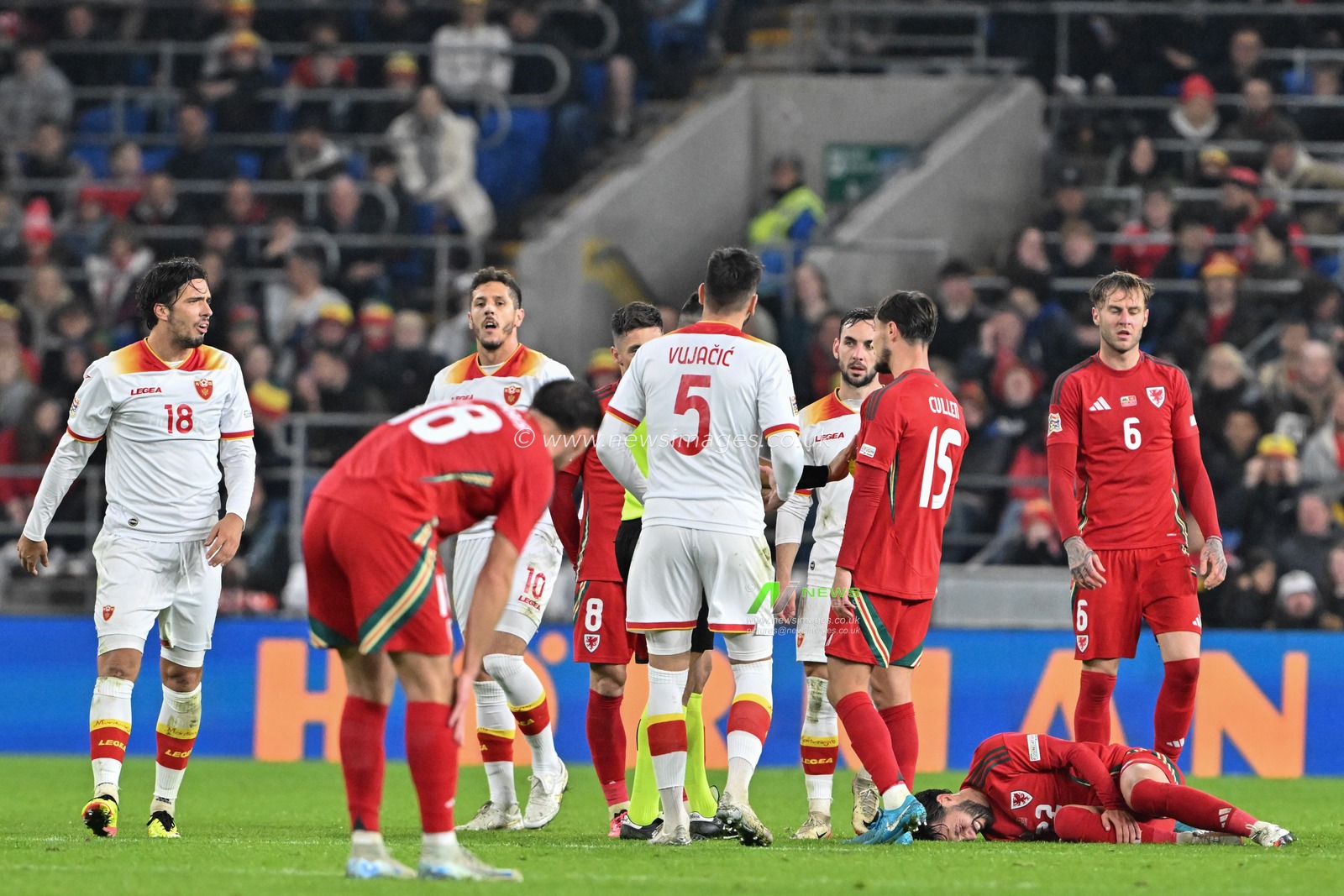 Josh Sheehan of Wales goes down during the UEFA Nations League - League B - Group 4 match Wales vs Montenegro at Cardiff City Stadium, Cardiff, United Kingdom, 14th October 2024

(Photo by Cody Froggatt/News Images)