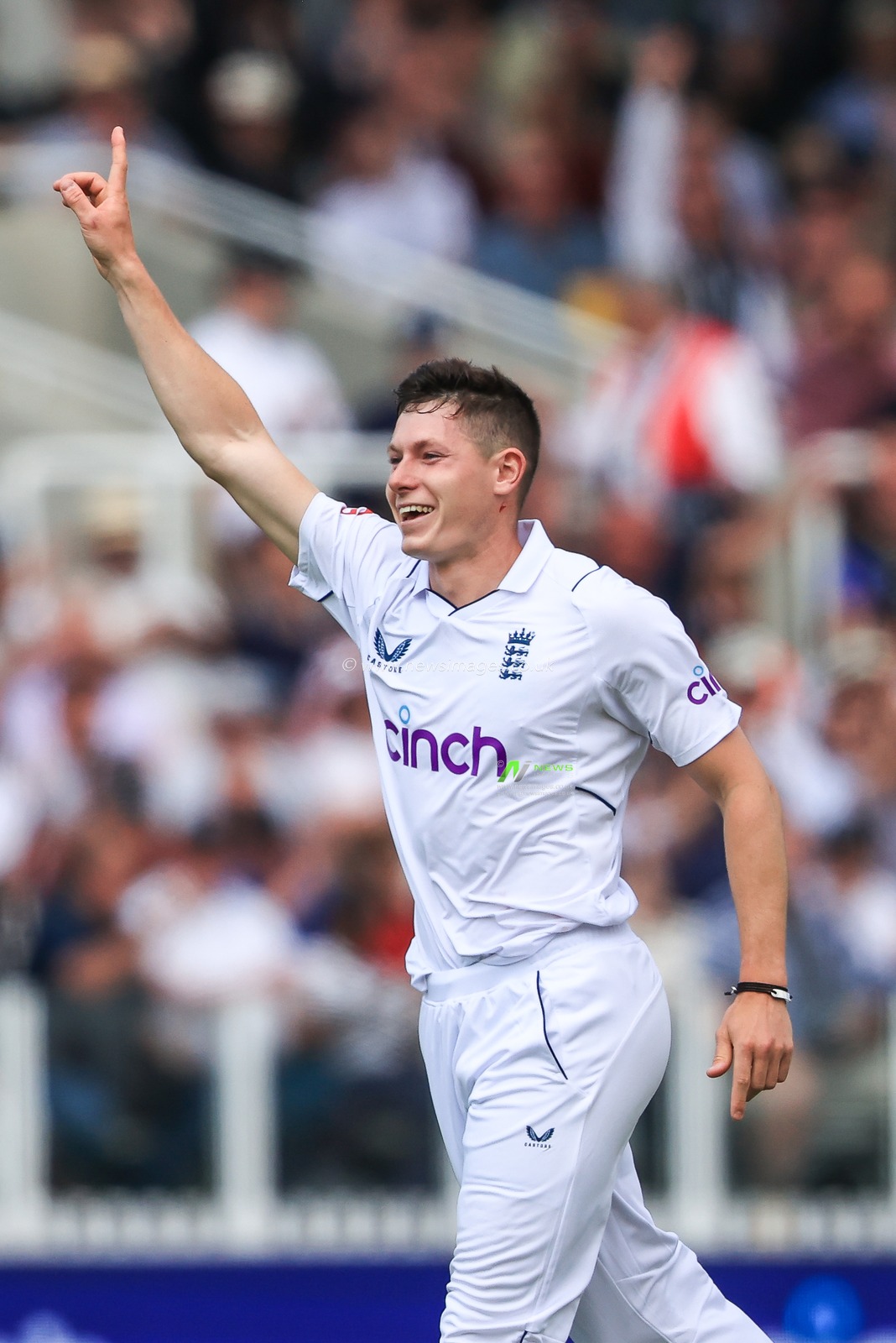 Matthew Potts of England celebrates catching Ajaz Patel of New Zealand LBW