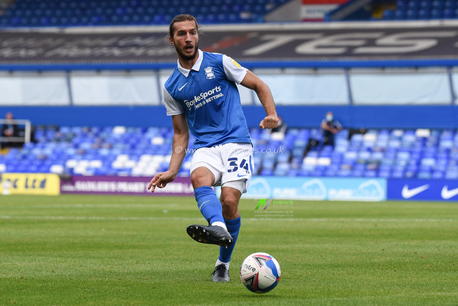 Ivan Sunjic (34) of Birmingham City passes the ball