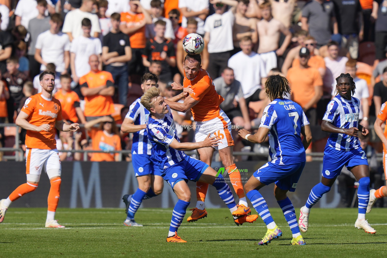 Matt Smith #8 of Wigan Athletic competes for a header with Jordan Rhodes #16 of Blackpool during the Sky Bet League 1 match Blackpool vs Wigan Athletic at Bloomfield Road, Blackpool, United Kingdom, 2nd September 2023

(Photo by Steve Flynn/News Images)