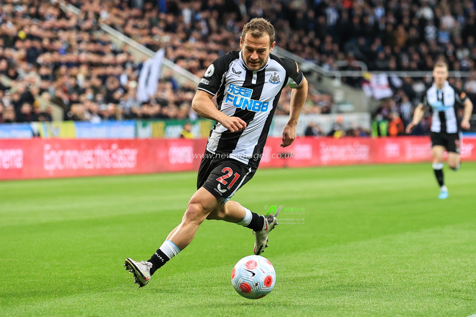 Ryan Fraser #21 of Newcastle United makes a break with the ball