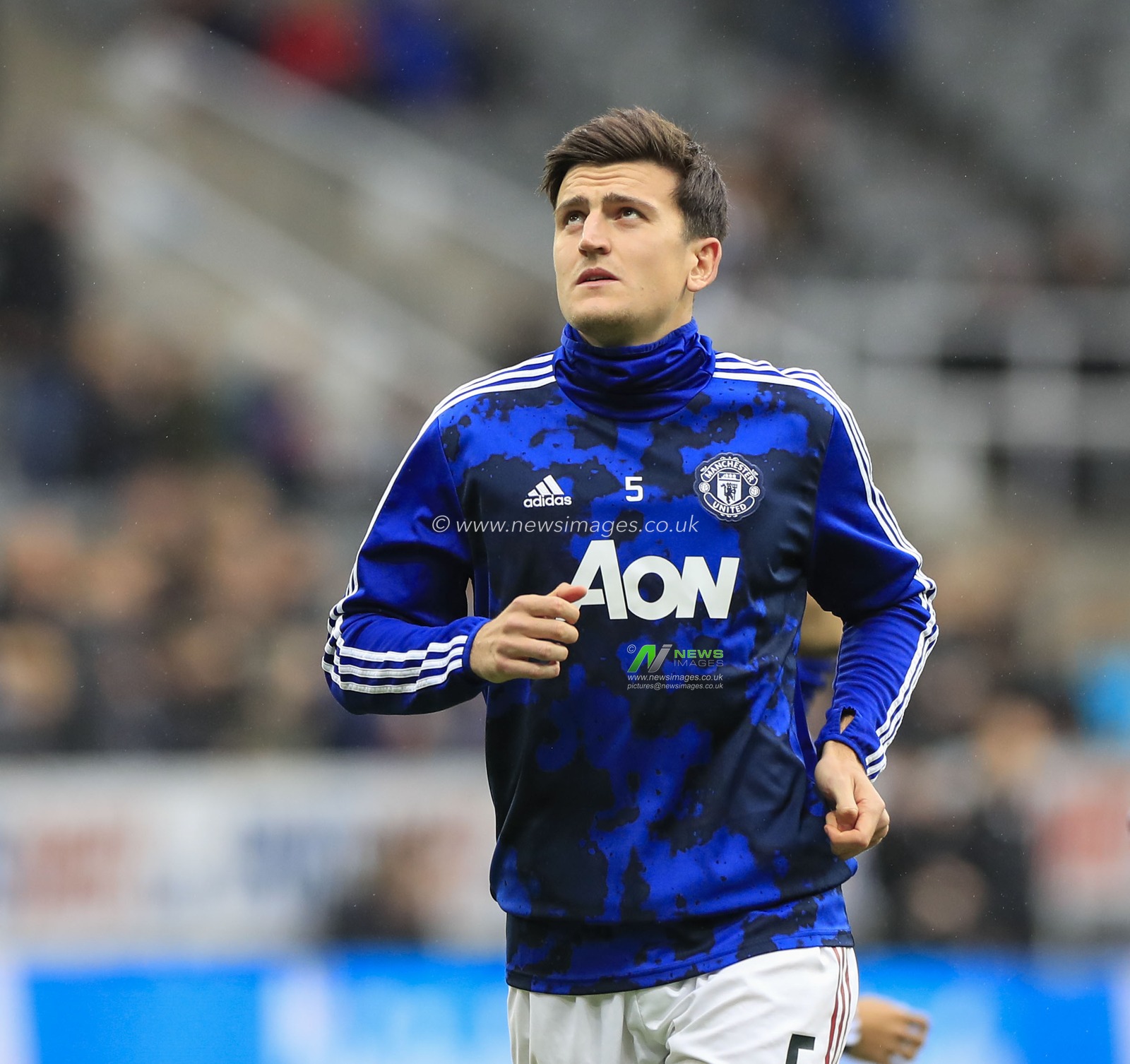 6th October 2019, St. James's Park, Newcastle, England; Premier League, Newcastle United v Manchester United : Harry Maguire (5) of Manchester United warms up for the game

Credit: Conor Molloy/News Images