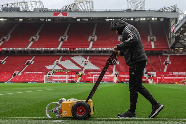 Ground staff marks the pitch during the Premier League match Manchester United vs Sunderland at Old Trafford, Manchester, United Kingdom, 4th October 2025

(Photo by Mark Cosgrove/News Images)