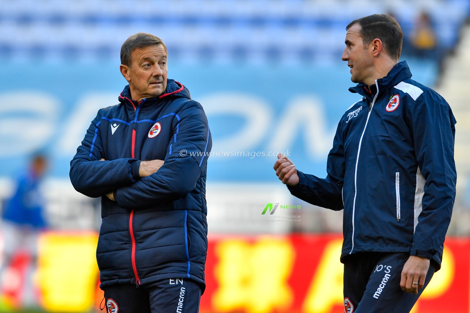 30th November 2019, DW Stadium, Wigan, England; Sky Bet Championship, Wigan Athletic v Reading : Reading Coach, John O'Shea and Reading Assistant Manager, Eddie Niedzwiecki have a discussion during the warm up

Credit: Simon Whitehead/News Images