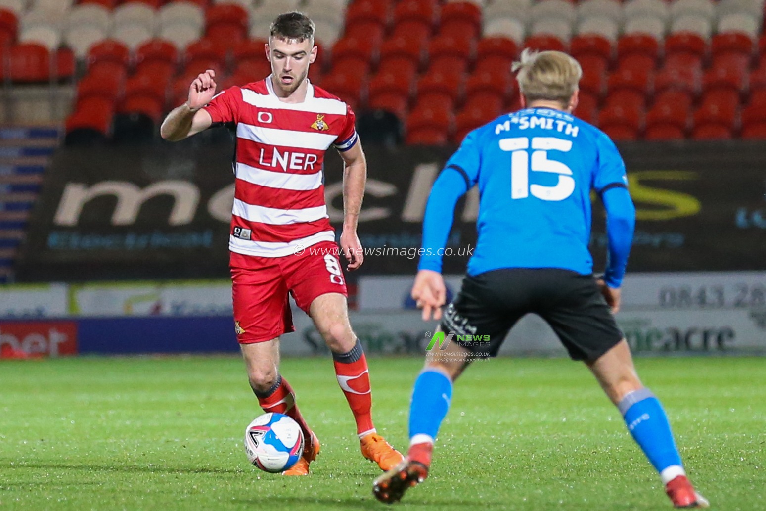 Ben Whiteman #8 of Doncaster Rovers in action during the game