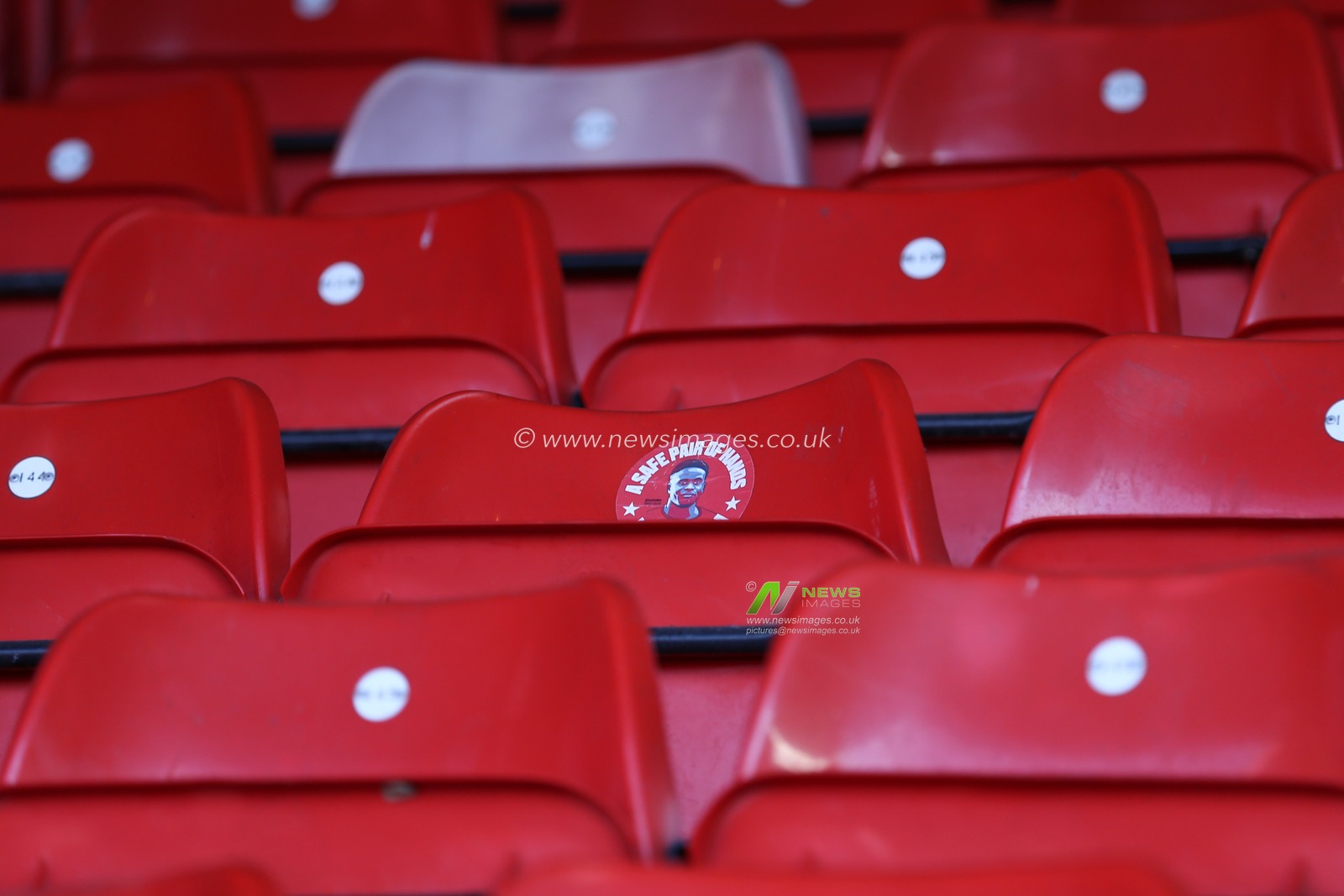 A sticker of Brice Samba is seen on a seat prior to the game