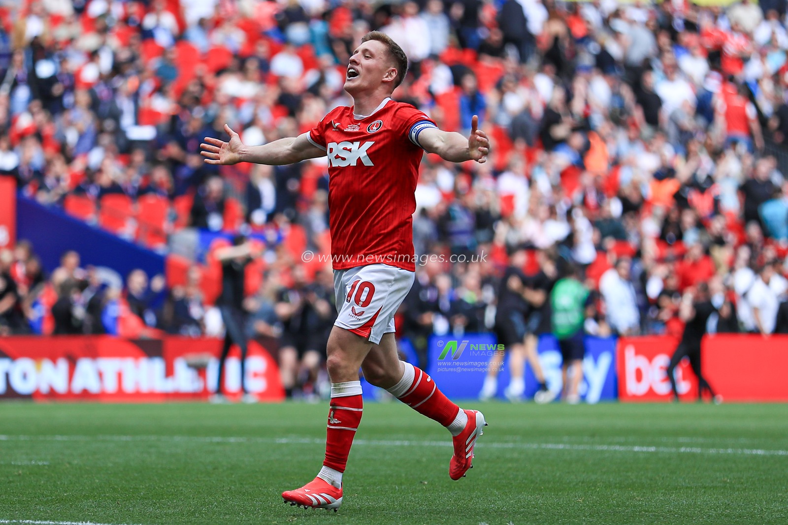 Greg Docherty of Charlton Athletic celebrates getting promotion back to the Sky Bet Championship after the Sky Bet League 1 Playoff Final match Charlton Athletic vs Leyton Orient at Wembley Stadium, London, United Kingdom, 25th May 2025

(Photo by Jorge Horsted/News Images)