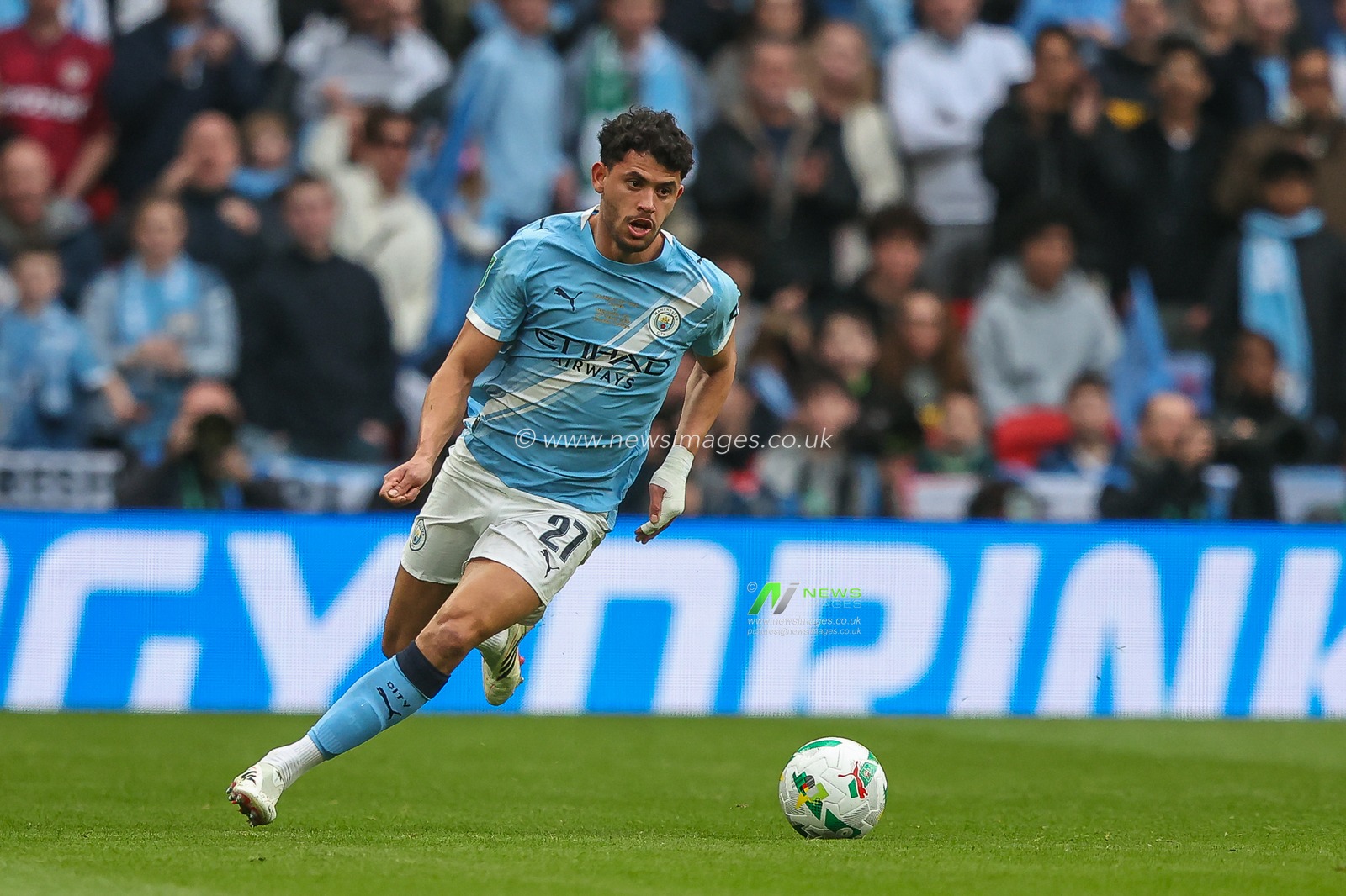 Matheus Nunes of Manchester City runs with the ball during the Carabao Cup Final match Arsenal vs Manchester City at Emirates, London, United Kingdom on 22 March 2026

(Photo by Alfie Cosgrove/News Images)