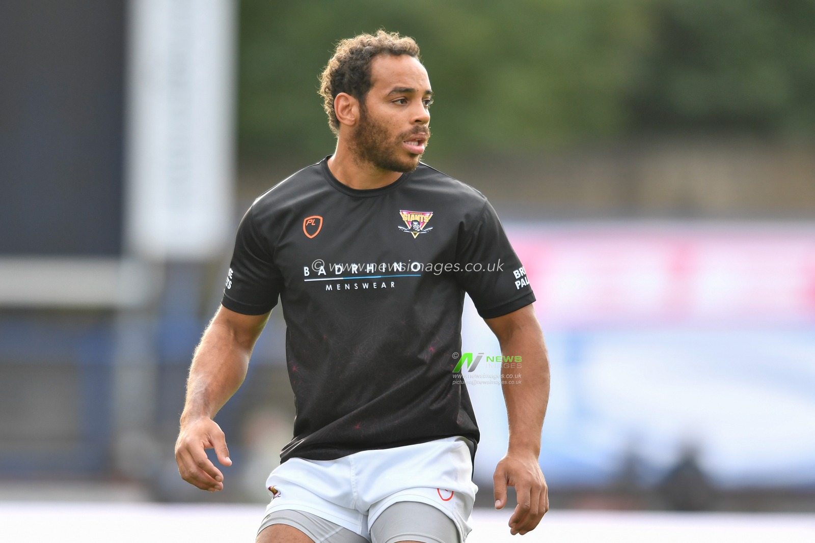 Leroy Cudjoe (21) of Huddersfield Giants during the pre-game warm up