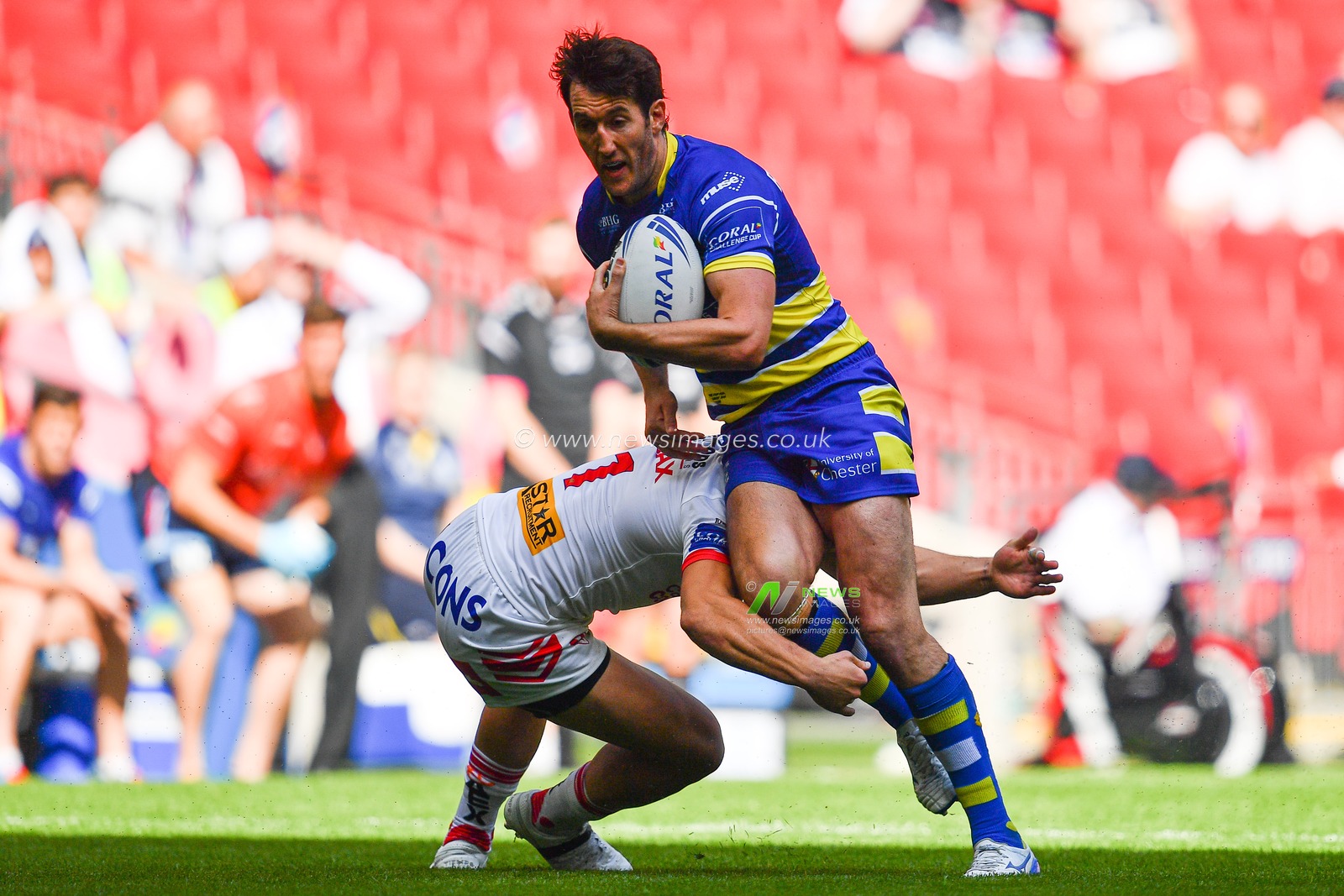 24th August 2019 , Wembley Stadium, London England ; 2019 Coral Challenge Cup Final ; St Helens vs Warrington Wolves ; Stefan Ratchford of Warrington Wolves is tackled by Jonny Lomax (1) of St Helens 



Credit: Craig Thomas/News Images