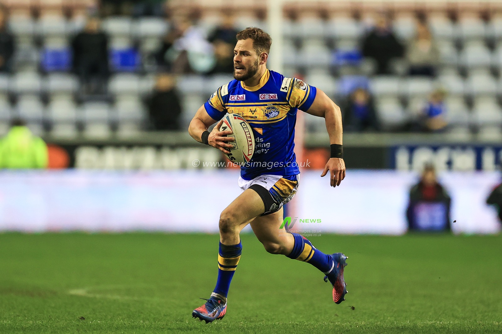 Aidan Sezer #7 of Leeds Rhinos makes a break