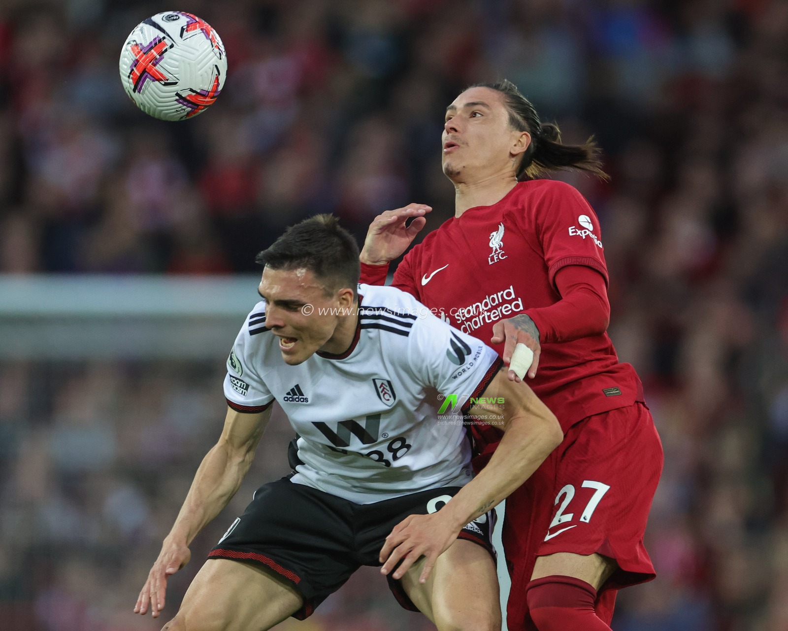 Darwin NÃºÃ±ez #27 of Liverpool fouls JoÃ£o Palhinha #26 of Fulham during the Premier League match Liverpool vs Fulham at Anfield, Liverpool, United Kingdom, 3rd May 2023

(Photo by Mark Cosgrove/News Images)