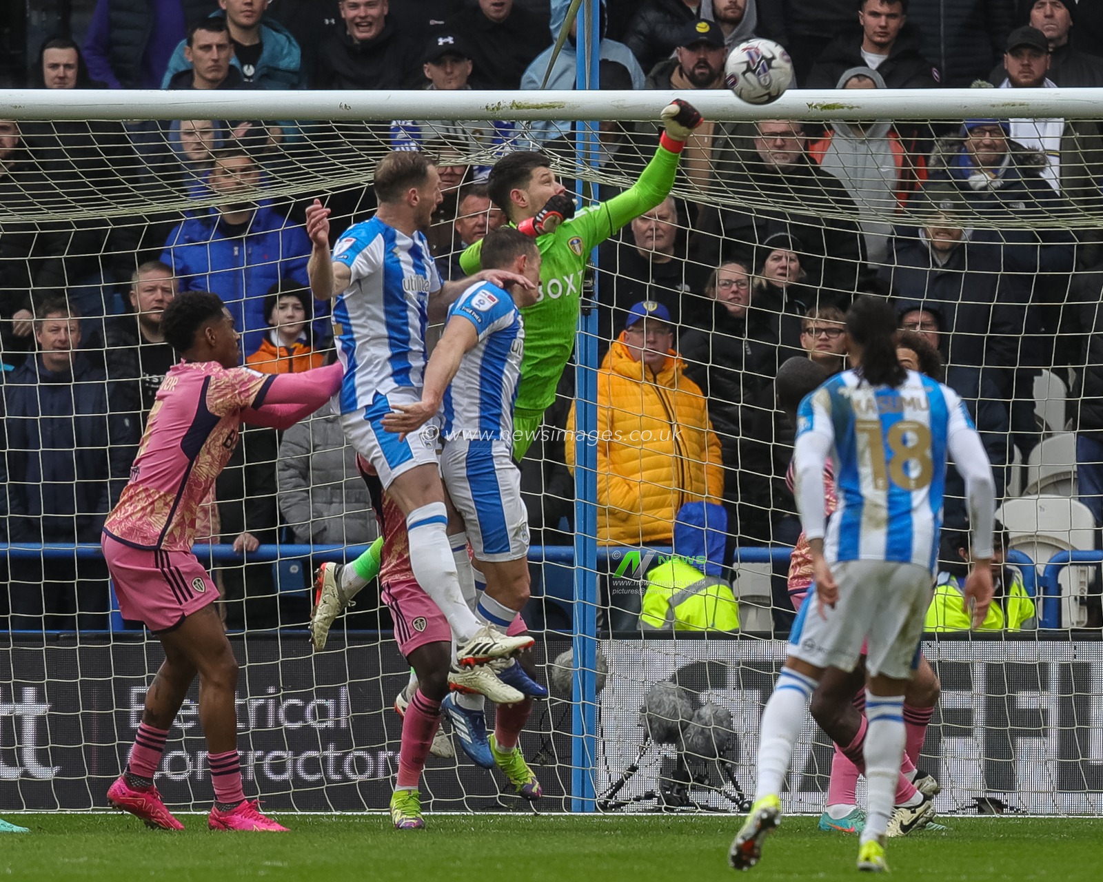 Illan Meslier of Leeds United punches the ball clear during the Sky Bet Championship match Huddersfield Town vs Leeds United at John Smith's Stadium, Huddersfield, United Kingdom, 2nd March 2024

(Photo by James Heaton/News Images)