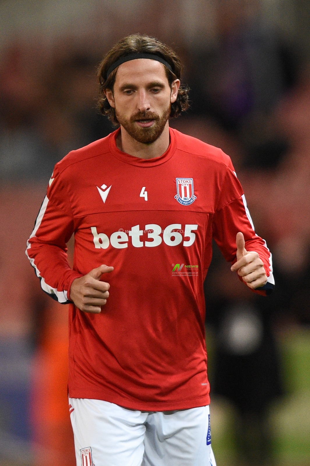 1st October 2019, Bet365 Stadium, Stoke-on-Trent, England; Sky Bet Championship, Stoke City v Huddersfield Town : Joe Allen (4) of Stoke City during the pre match warm up.

Credit: Richard Long/News Images