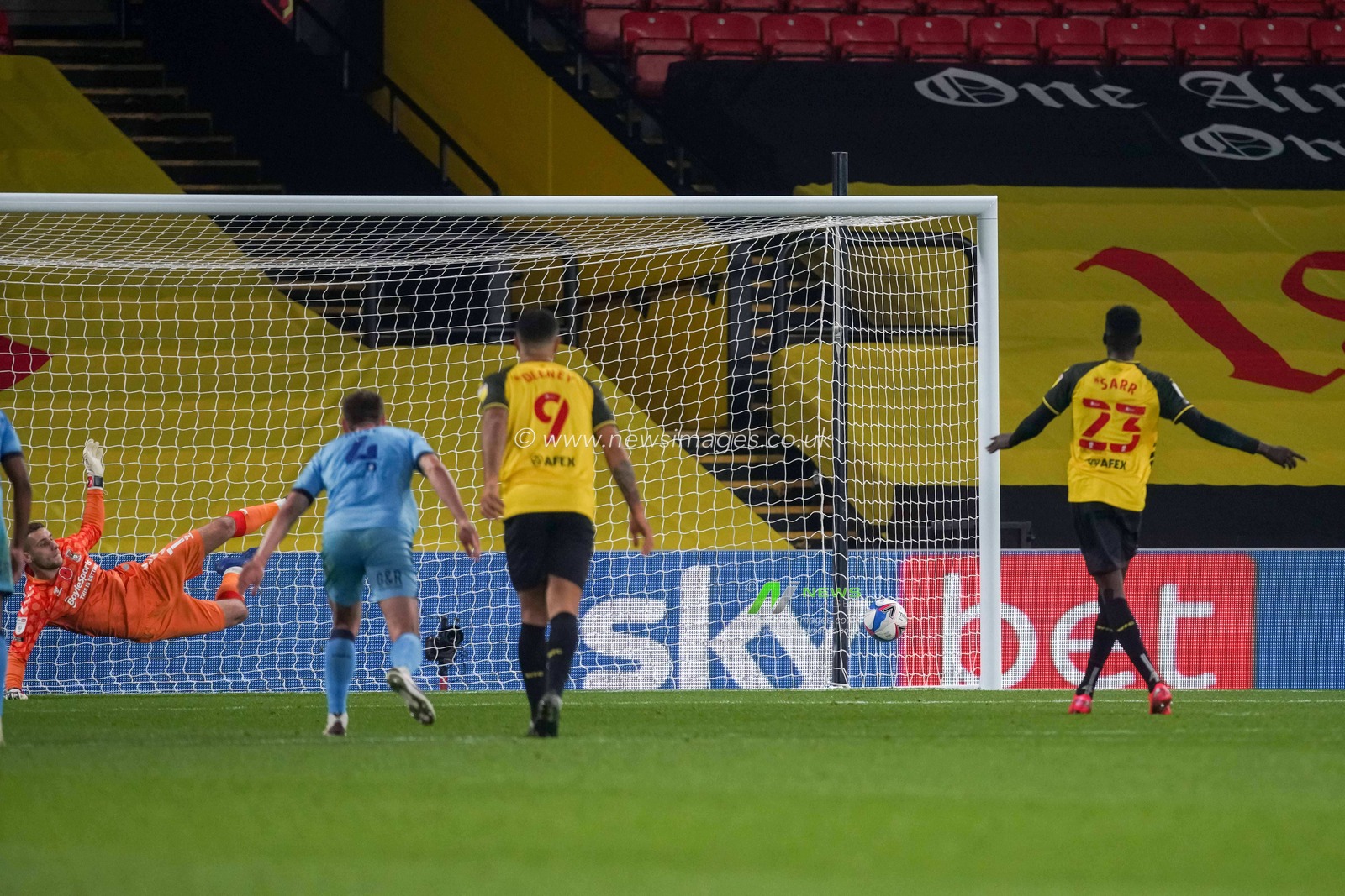 Ismaila Sarr #23 of Watford score from the penalty spot to win the game 3:2