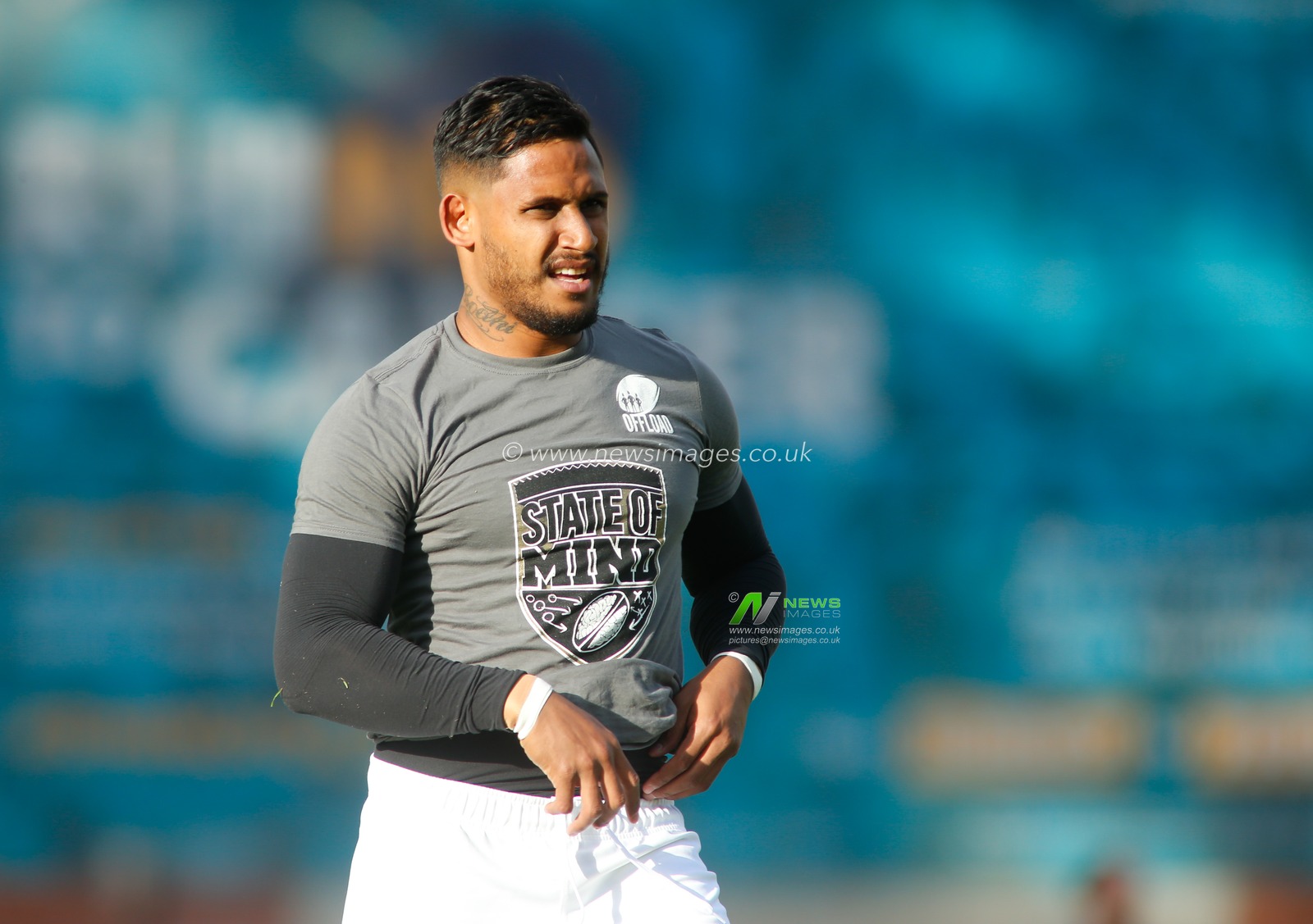 Friday 15th June 2018 , Emerald Headingley Stadium, Leeds, England; Betfred Super League, Leeds Rhinos v St Helens; Ben Barba of St Helens warms up ahead of the game wearing a State of Mind Offload warm up t-shirt  showing support for mens mental health.