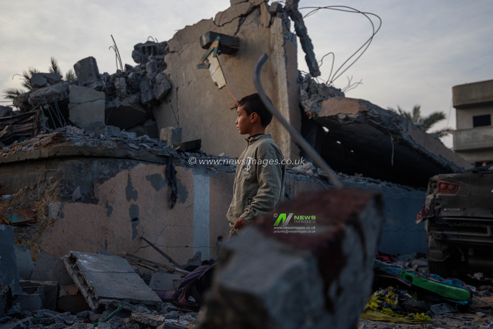 11 were killed and several injured as a result of an Israeli airstrike targeting the home of the Shahin family last night in Deir al-Balah. The house, which consisted of several floors, was destroyed on top of its residents.(Photo: Mohammed Skaik/News Images)