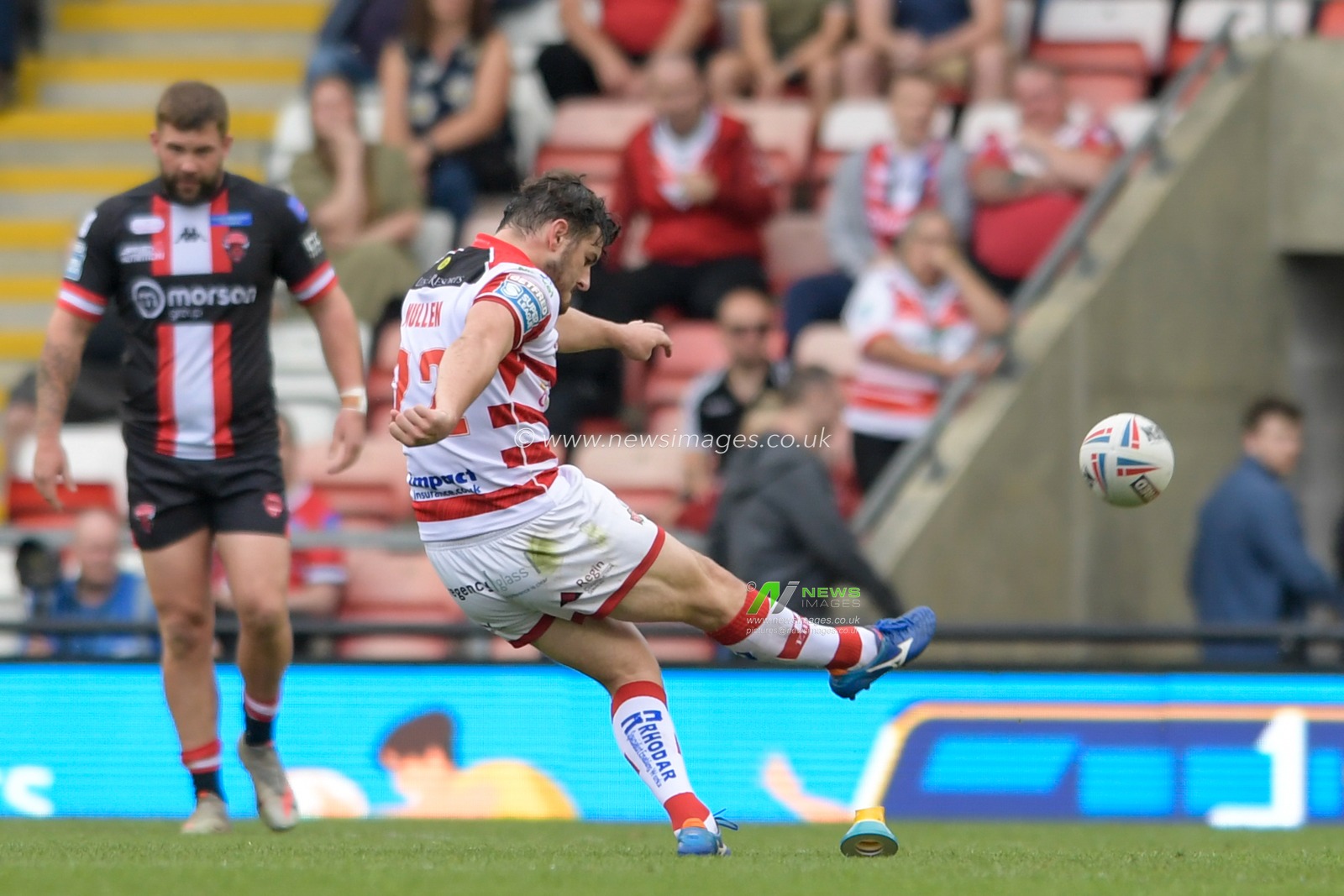 Craig Mullen (22) of Leigh Centurions successfully kicks a penalty