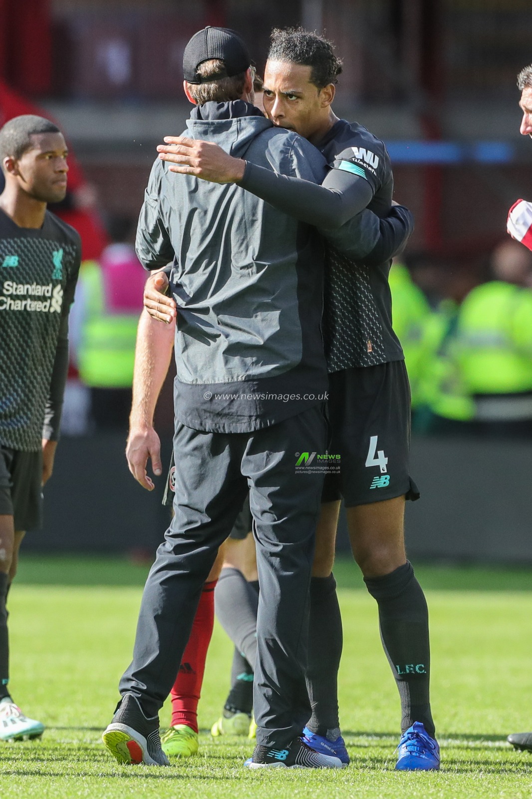 28th September 2019, Bramall Lane, Sheffield, England; Premier League, Sheffield United v Liverpool : Jurgen Klopp manager of Liverpool hugs and congratulates Virgil van Dijk (4) of Liverpool after Liverpool win 0-1

Credit: Mark Cosgrove/News Images