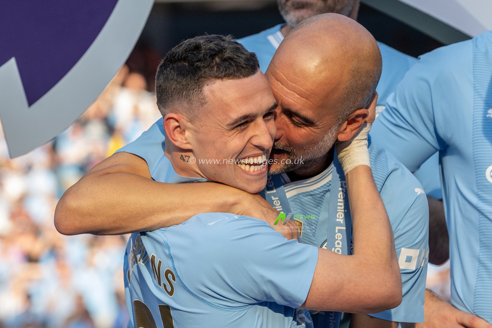 Pep Guardiola manager of Manchester City embraces Phil Foden of Manchester City after wining the Premier League uring the Premier League match Manchester City vs West Ham United at Etihad Stadium, Manchester, United Kingdom, 19th May 2024

(Photo by Mark Cosgrove/News Images)